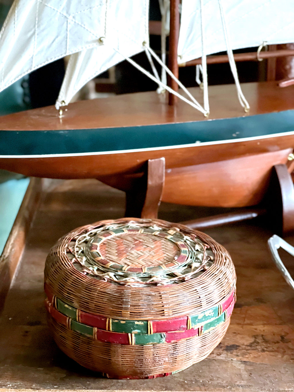 small Hong Kong woven basket with muted tones and patina
