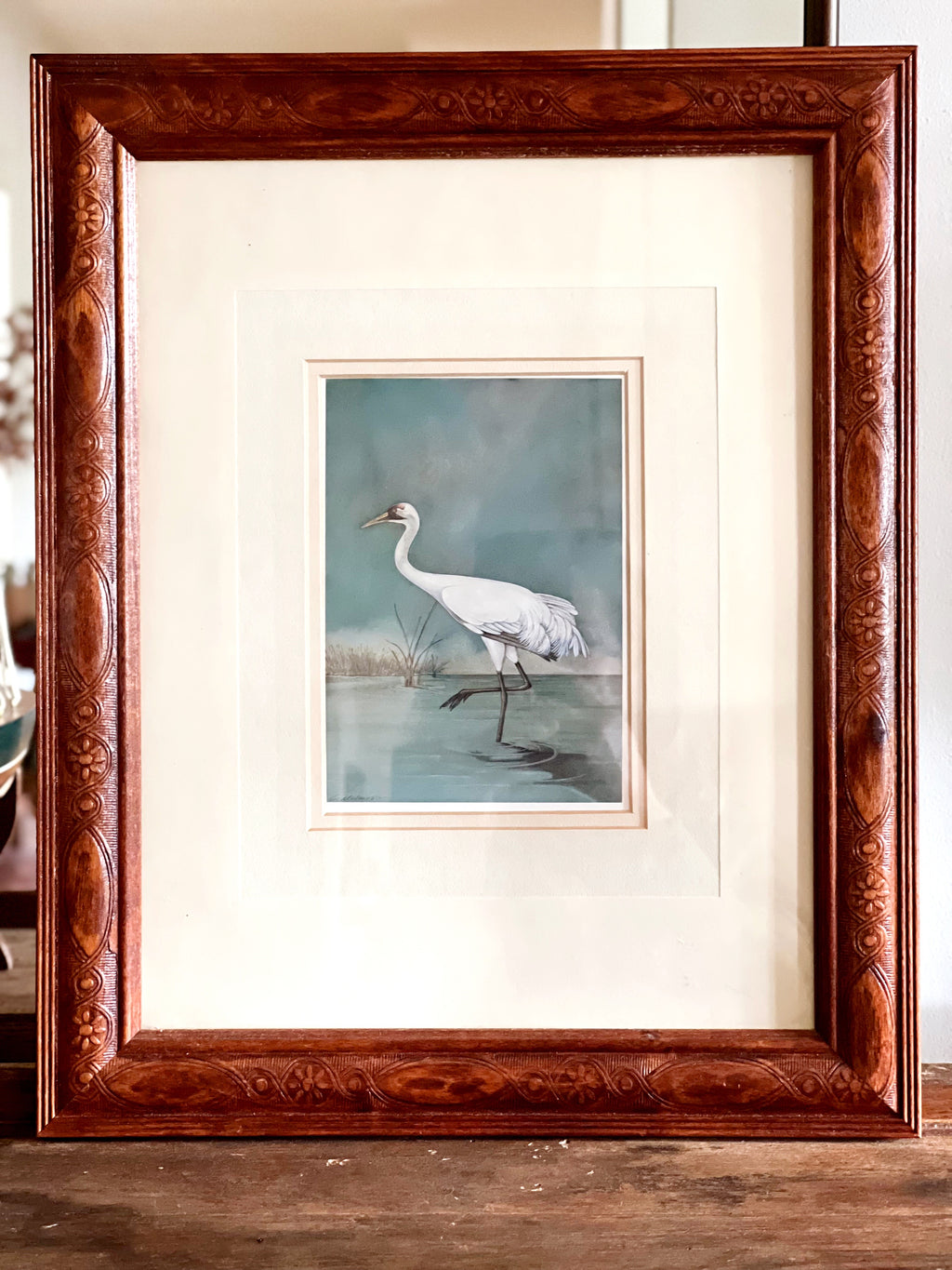 heron illustration in warm wood frame for shelf display