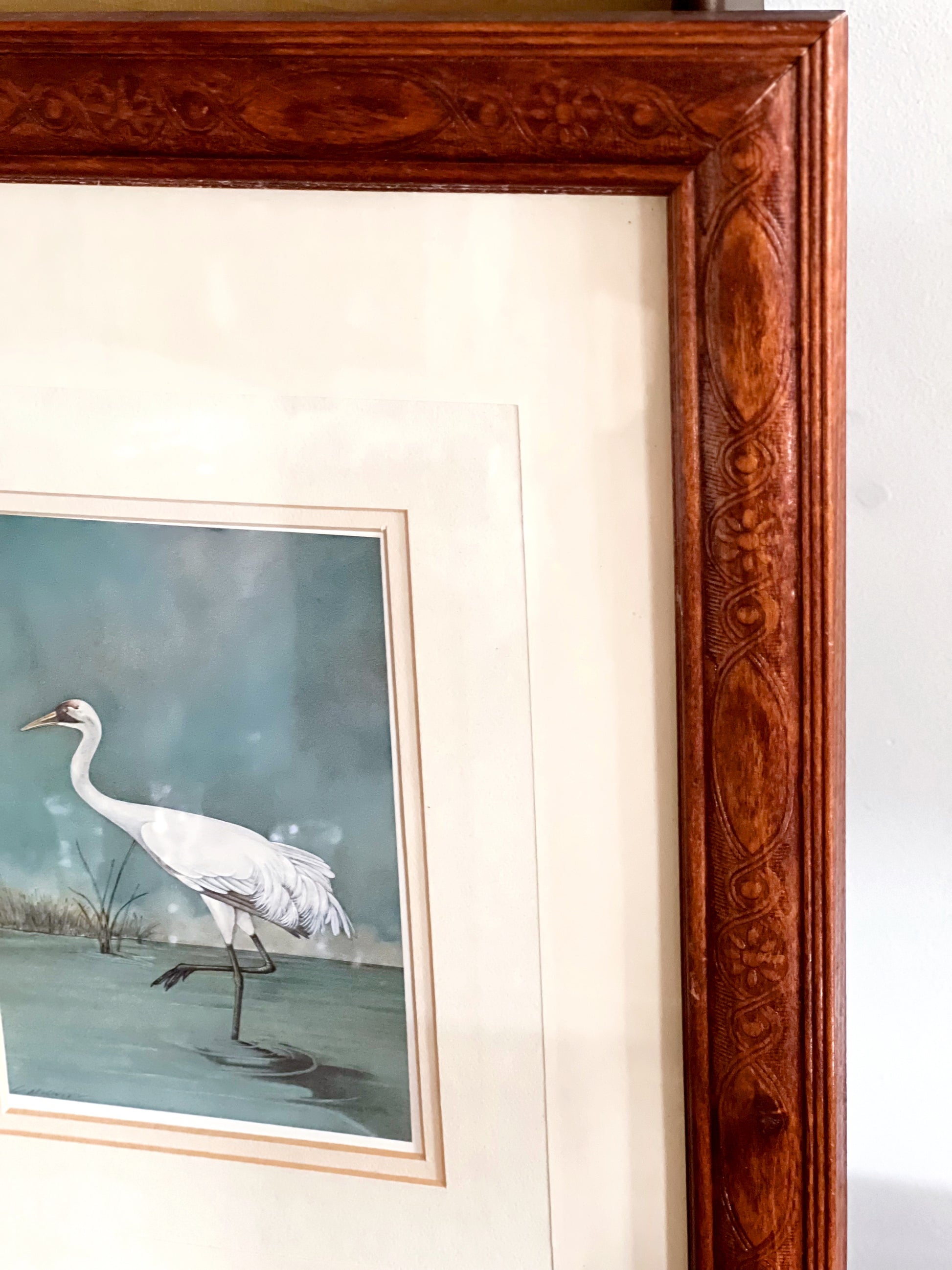 close up of heron artwork and mat detail