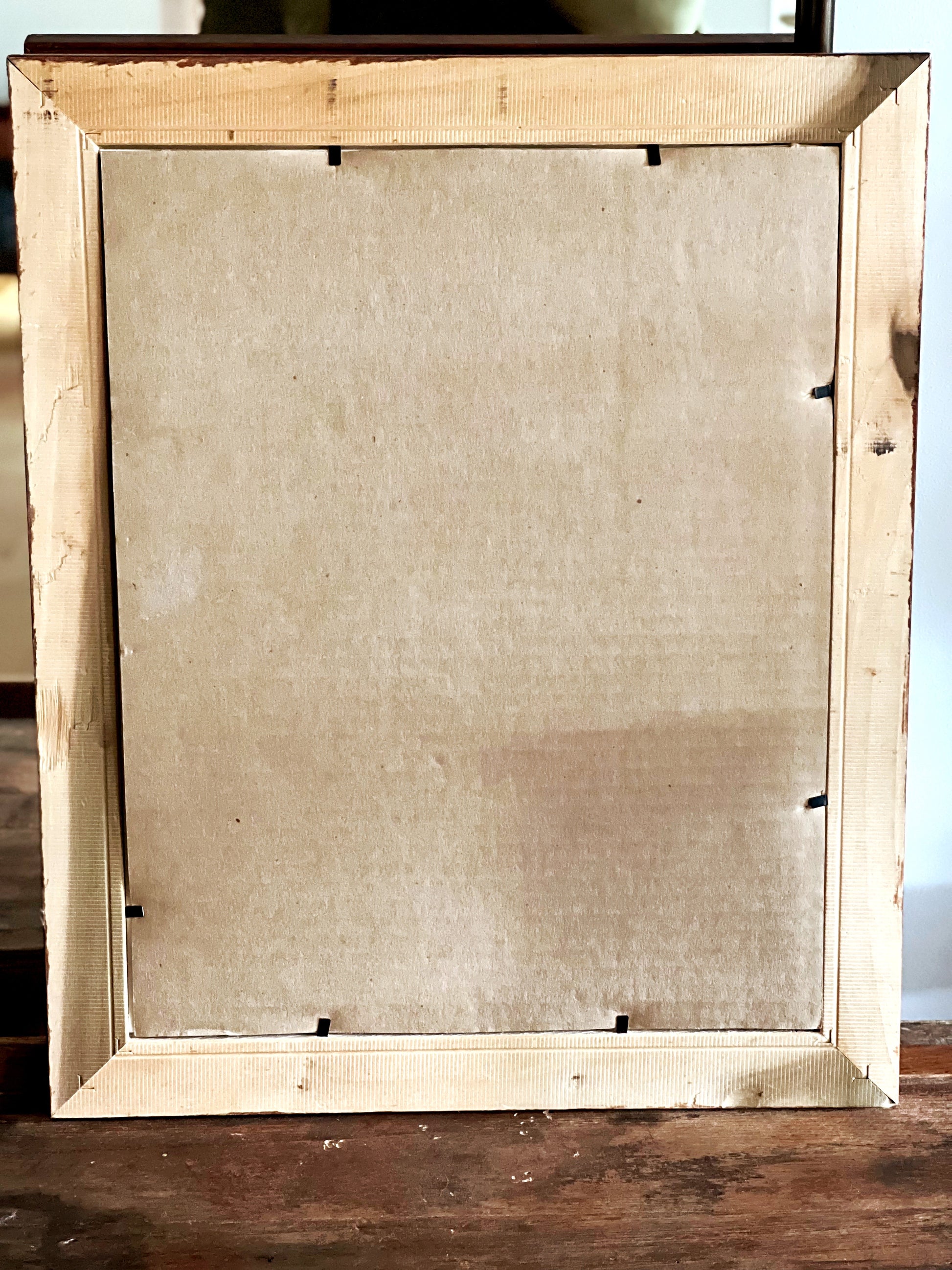 back of framed print showing construction and condition