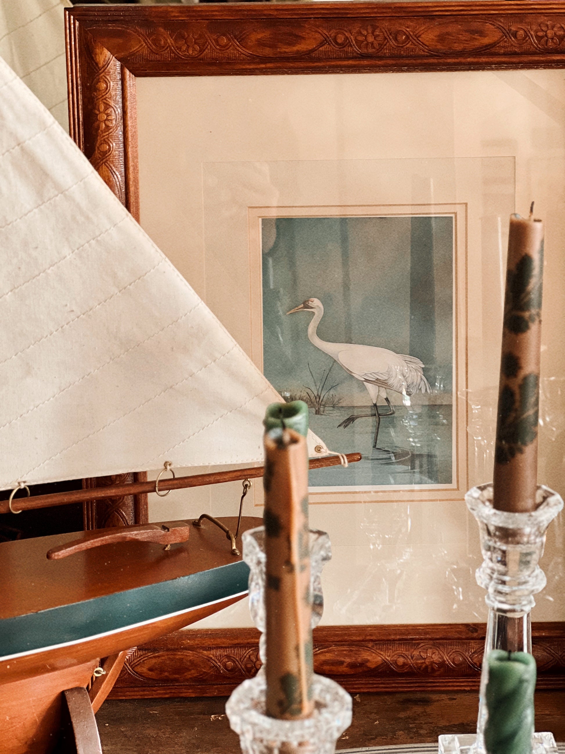 vintage heron print in carved wood frame with matting