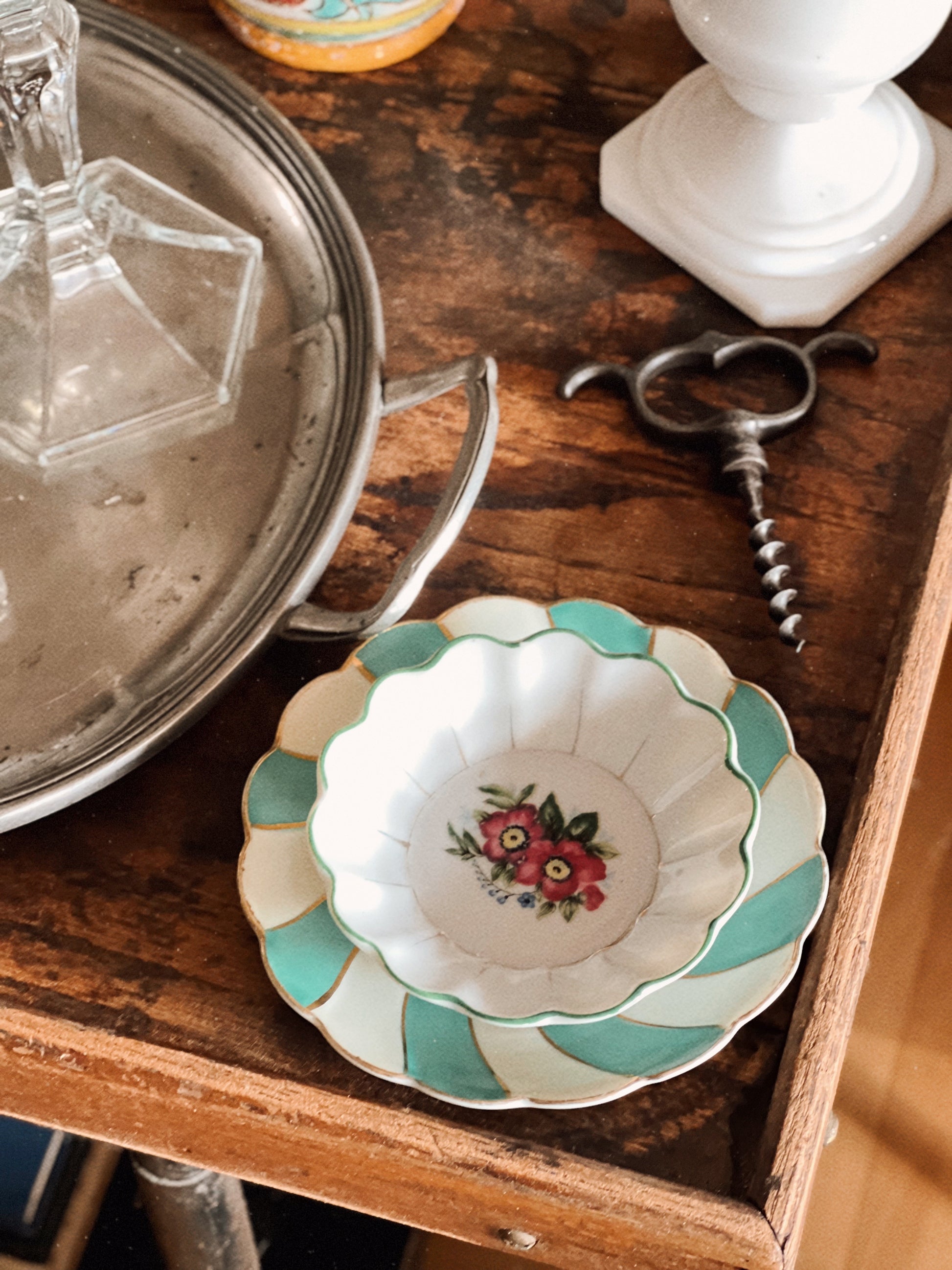 small plates layered into collected interior vignette