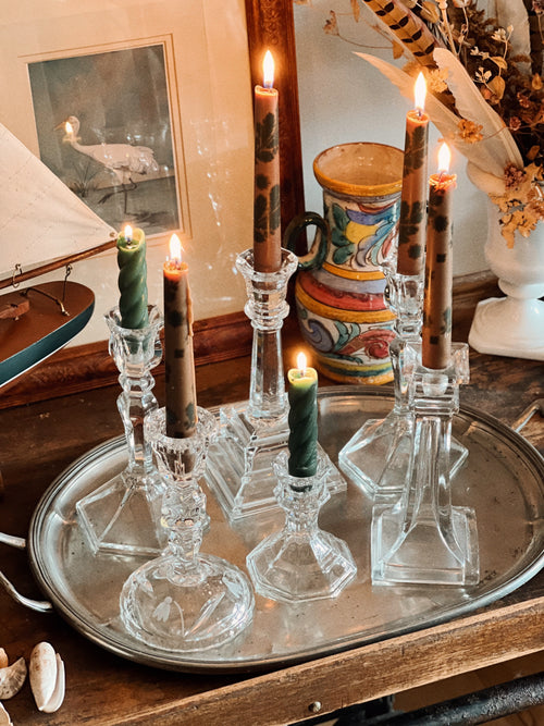 collected mix of glass and crystal taper holders styled together