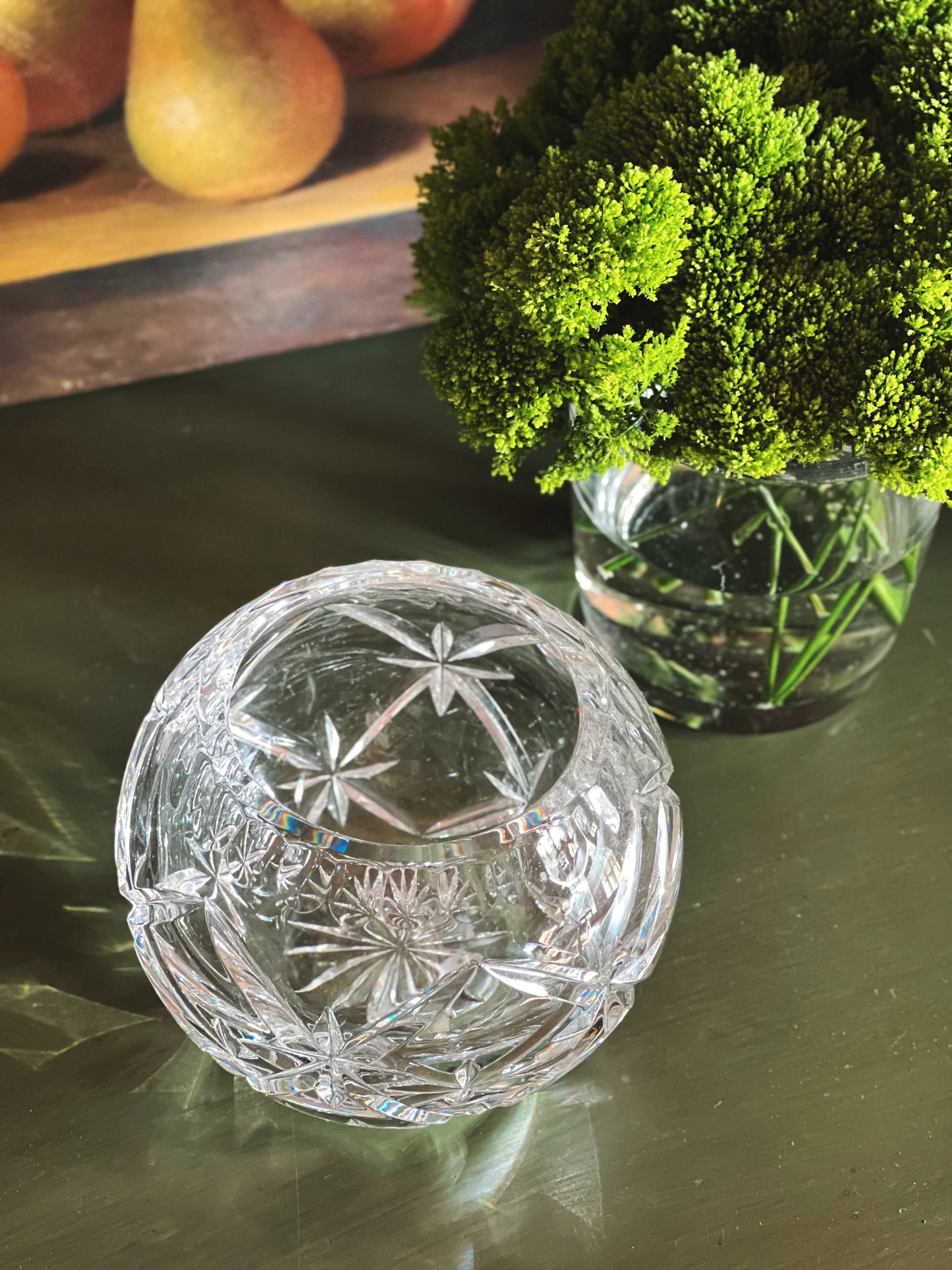 Vintage crystal bud vase styled for candlelit entertaining and layered tabletop decor