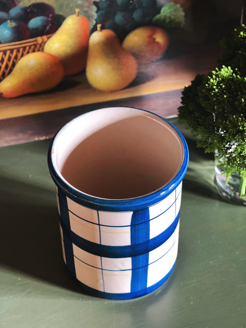 Vintage plaid ceramic crock in blue and cream shown empty from angled side view