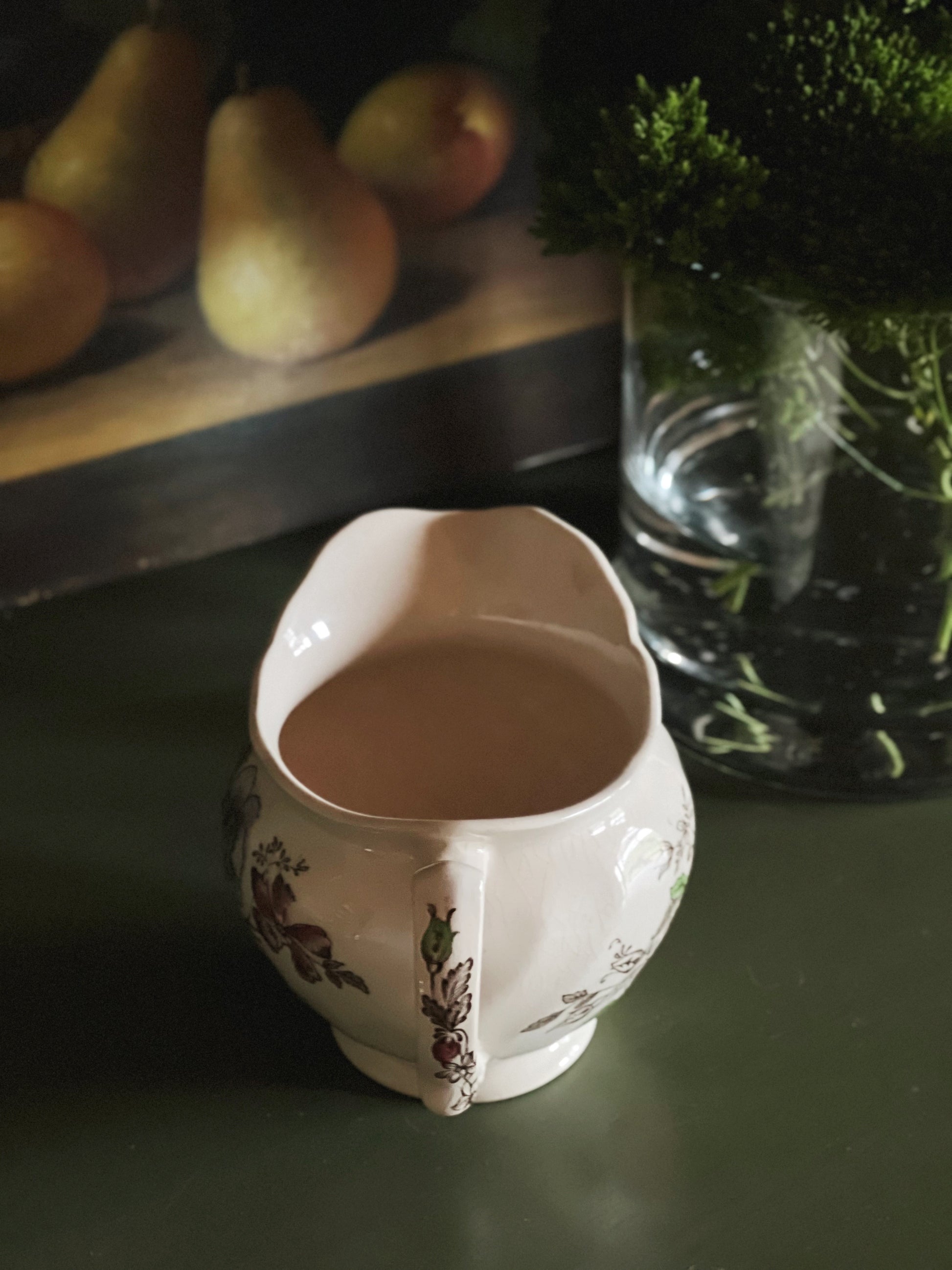 Handle detail of a Sheraton creamer by Johnson Brothers