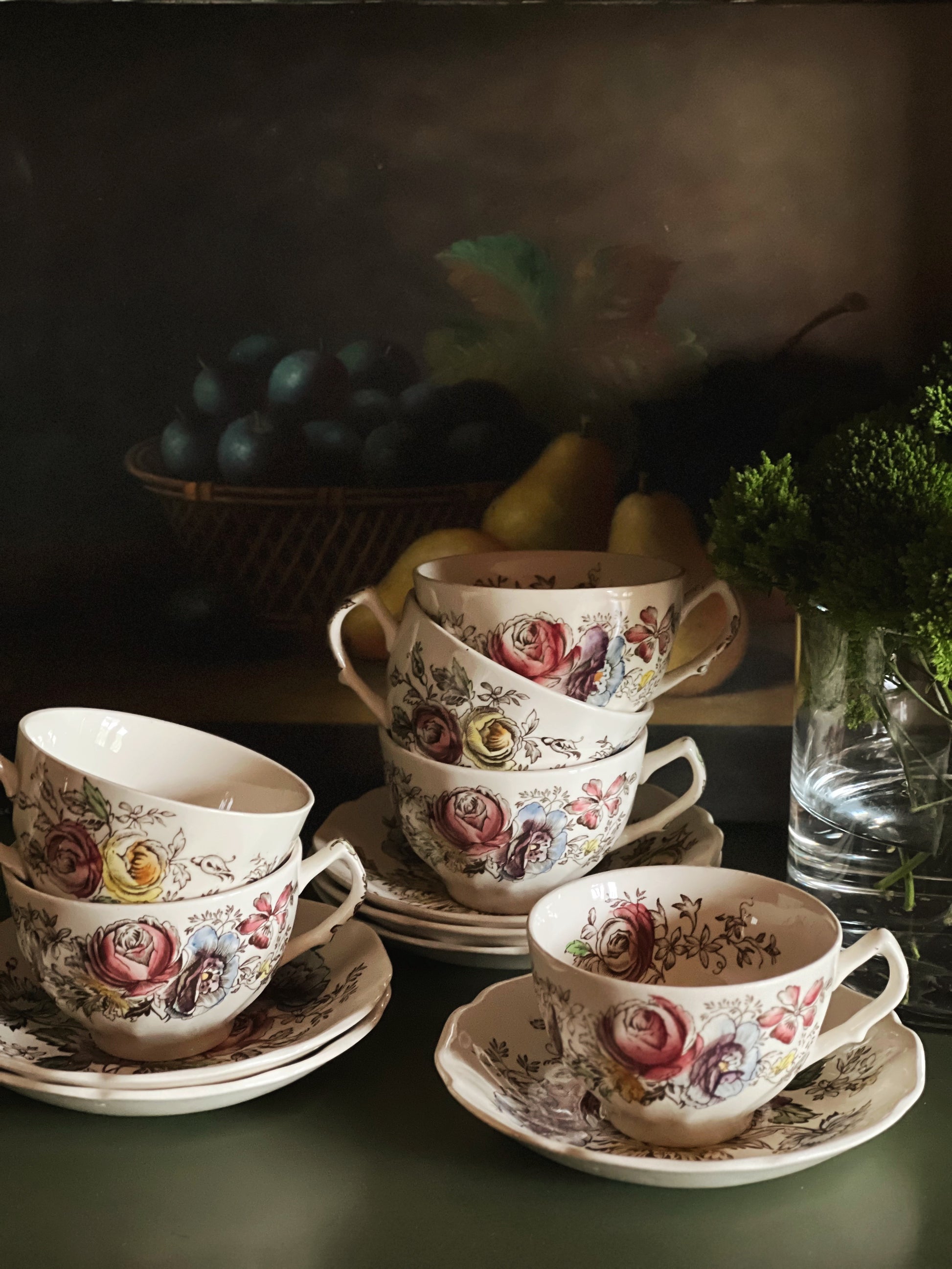 Stacked teacups and saucers in the Sheraton pattern by JOHNSON BROTHERS