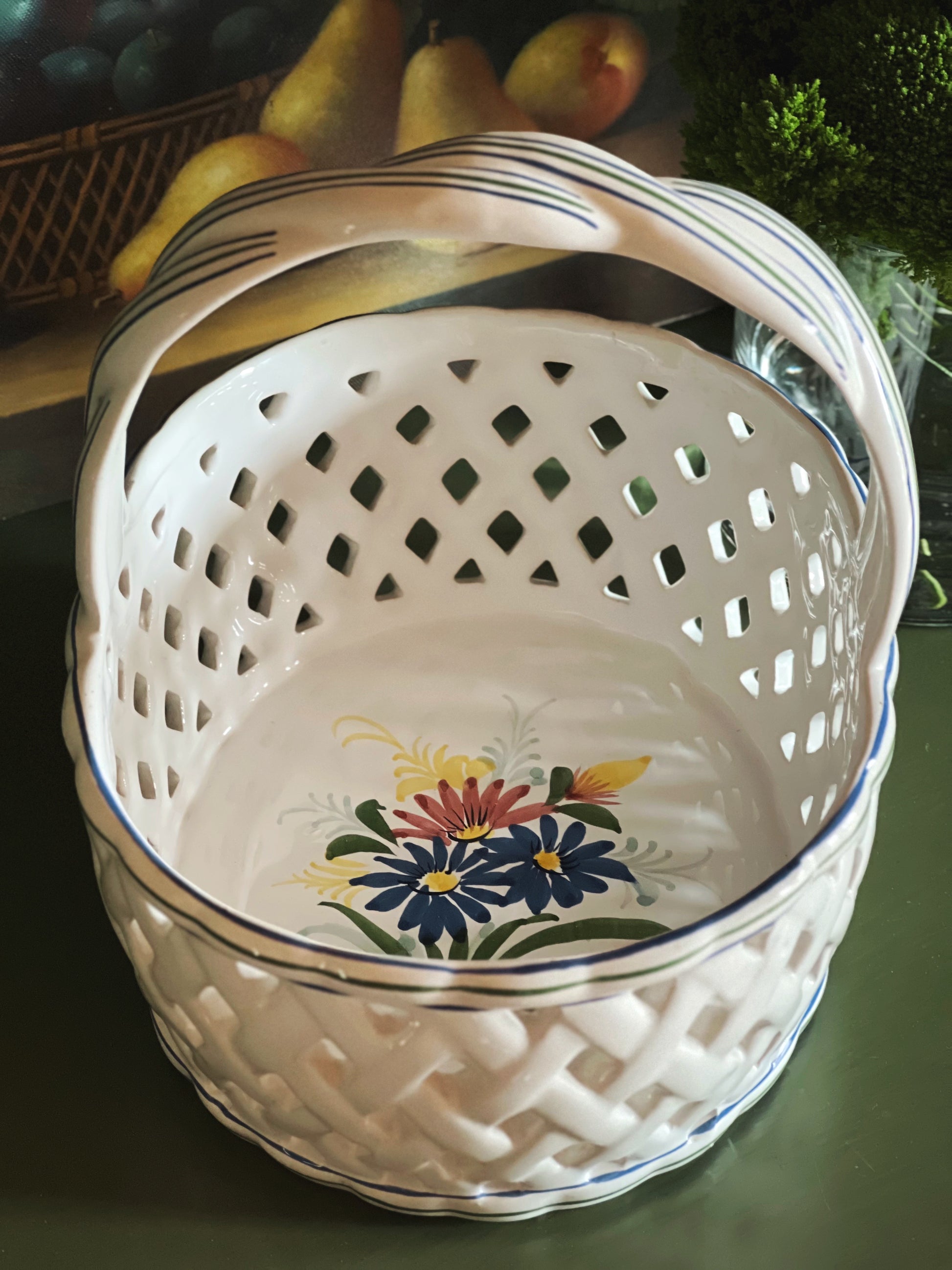 Floral detailing inside a ceramic basket