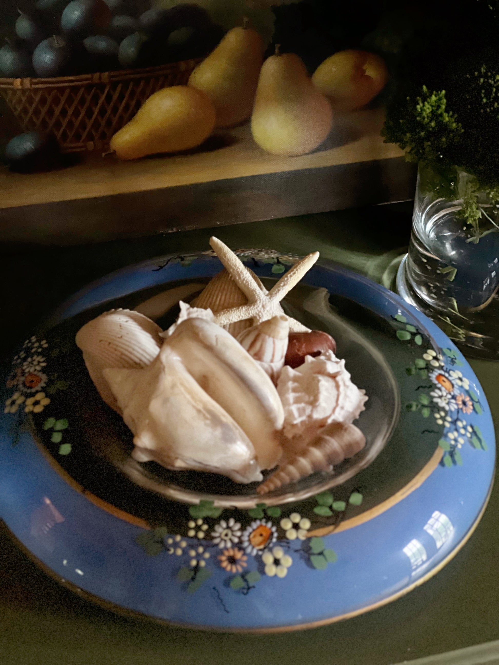 hand painted glass console bowl by Indiana Glass filled with seashells 