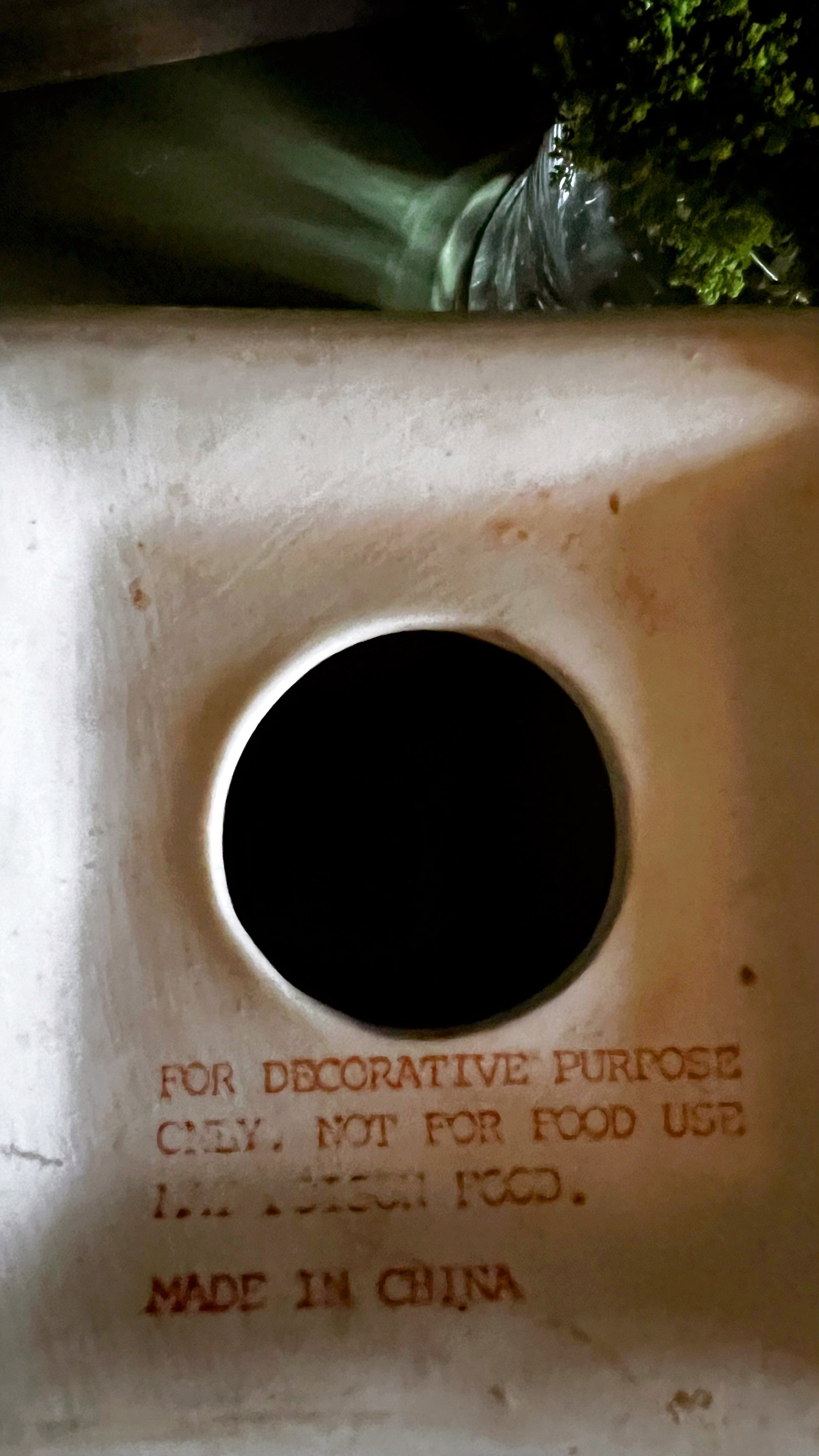 maker's mark on the underside of a Chinese porcelain candleholder