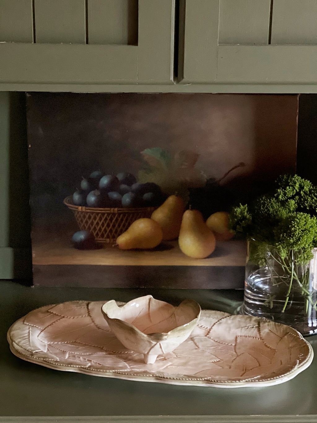 Italian ceramic leaf platter displayed in collected cottage kitchen styling