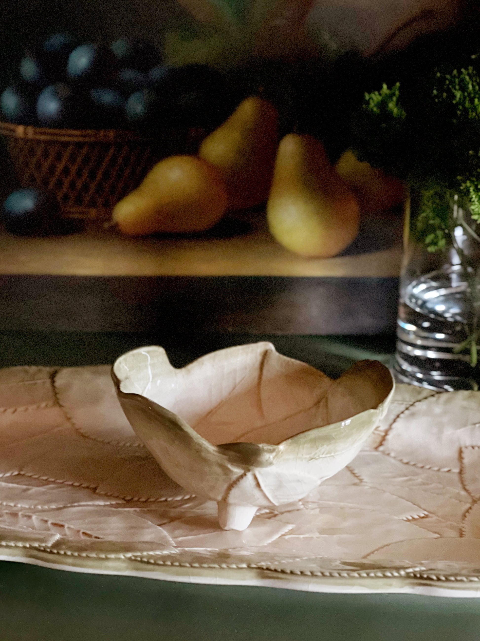 pairing of Italian ceramic sauce bowl and matching platter