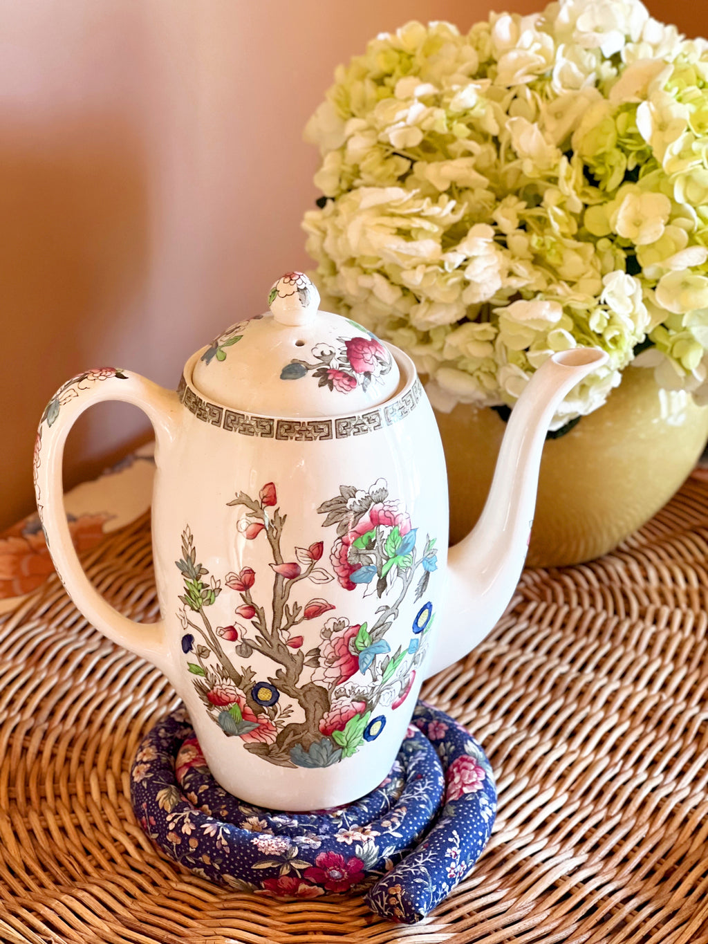 English floral transferware coffee pot styled for a cozy morning tea ritual