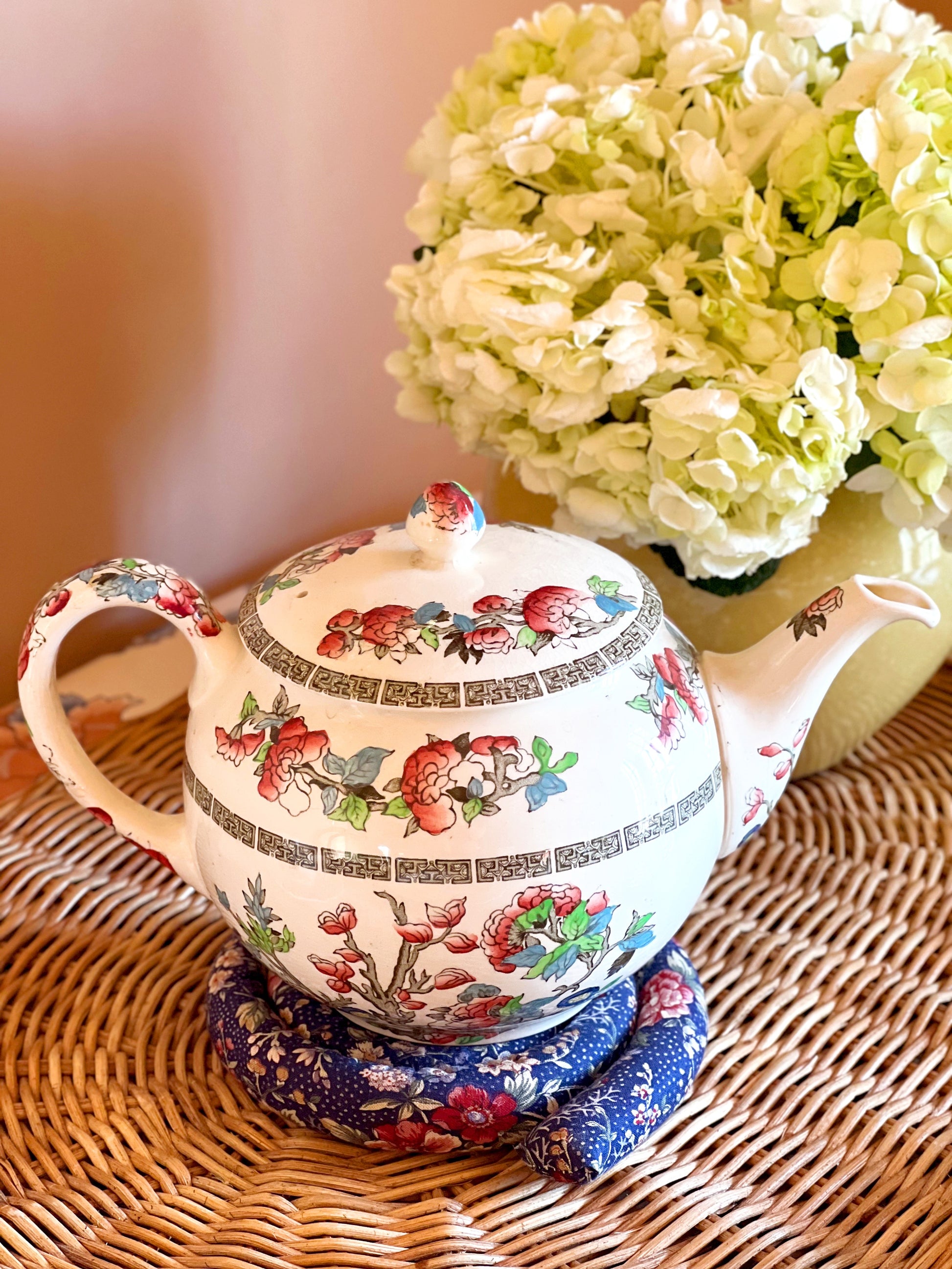 English floral transferware tea pot in warm cottage-inspired setting
