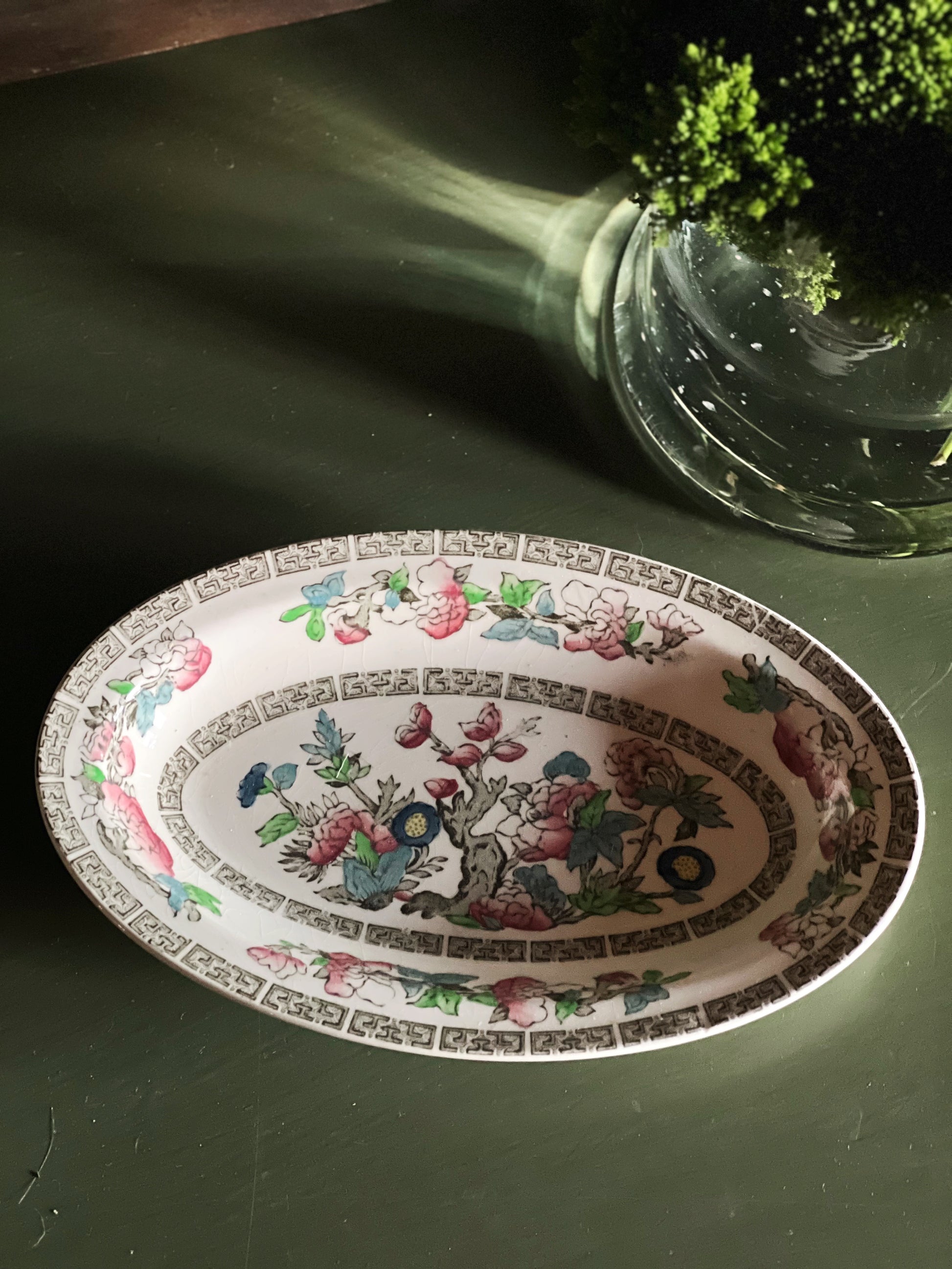Vintage Johnson Brothers Indian Tree relish tray photographed in moody reflective light