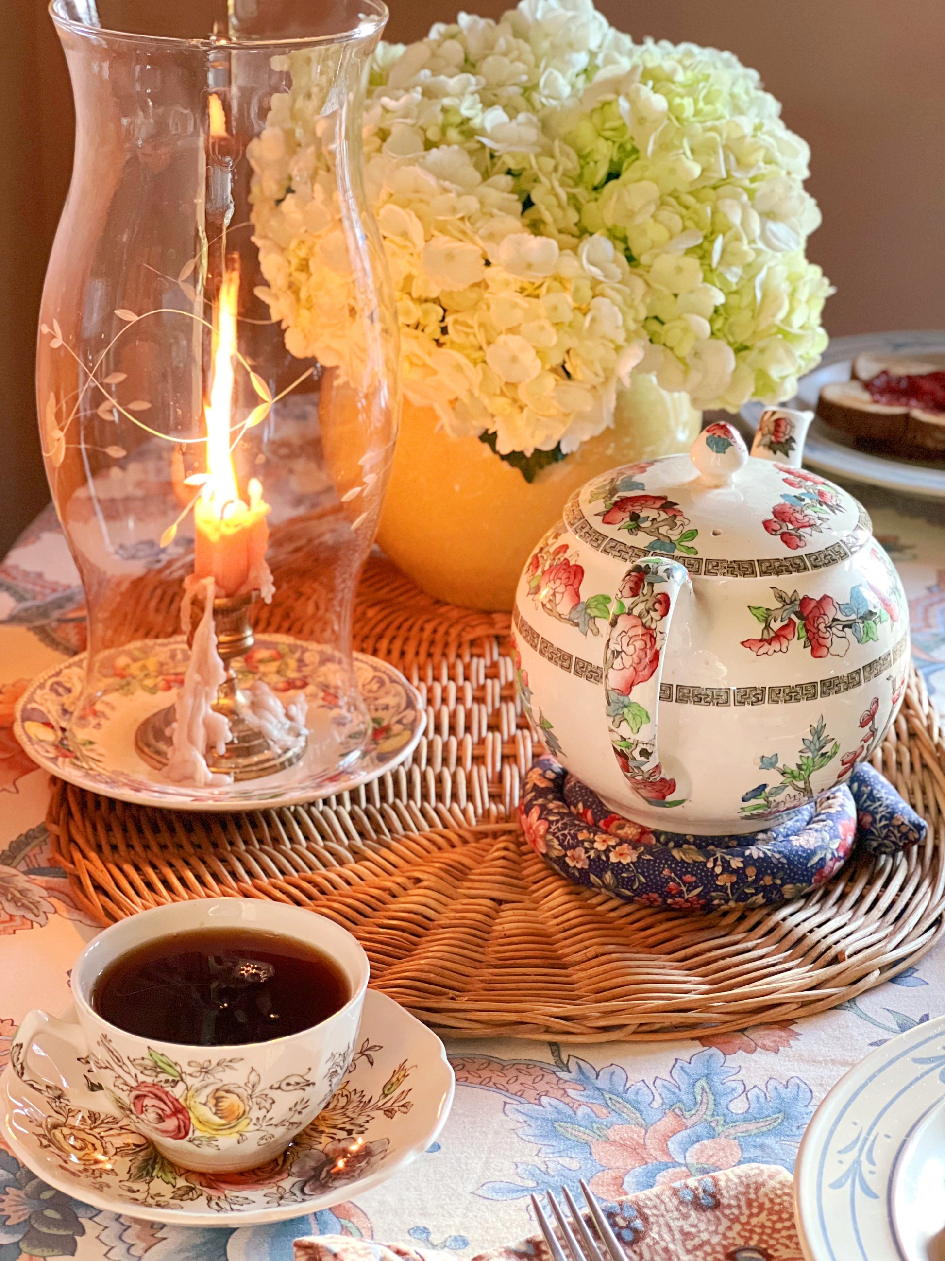 Breakfast table set with an Indian Tree teapot and Sheraton cup and saucer