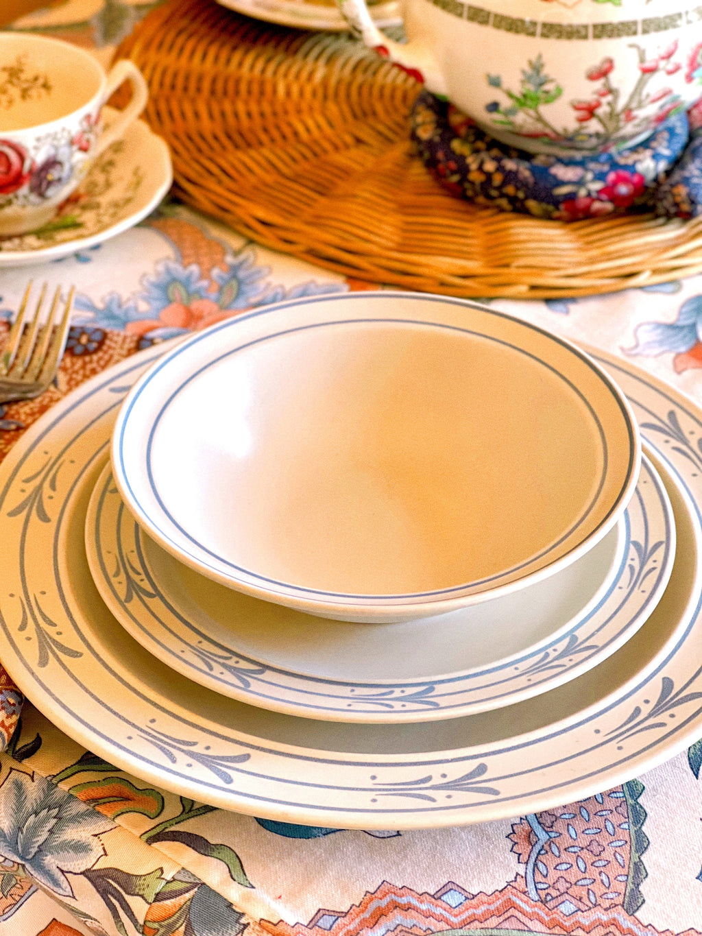 side view of a stack of Blue Leaf Japan stoneware dinnerware 