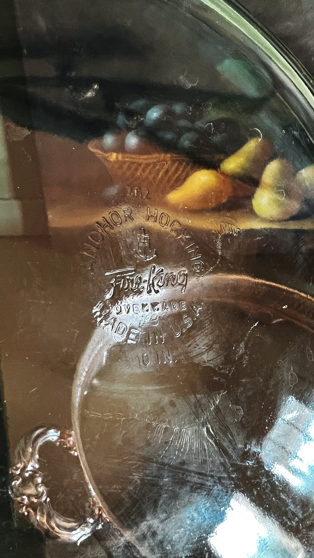 Glass pie plate with 'Fire King' branding 