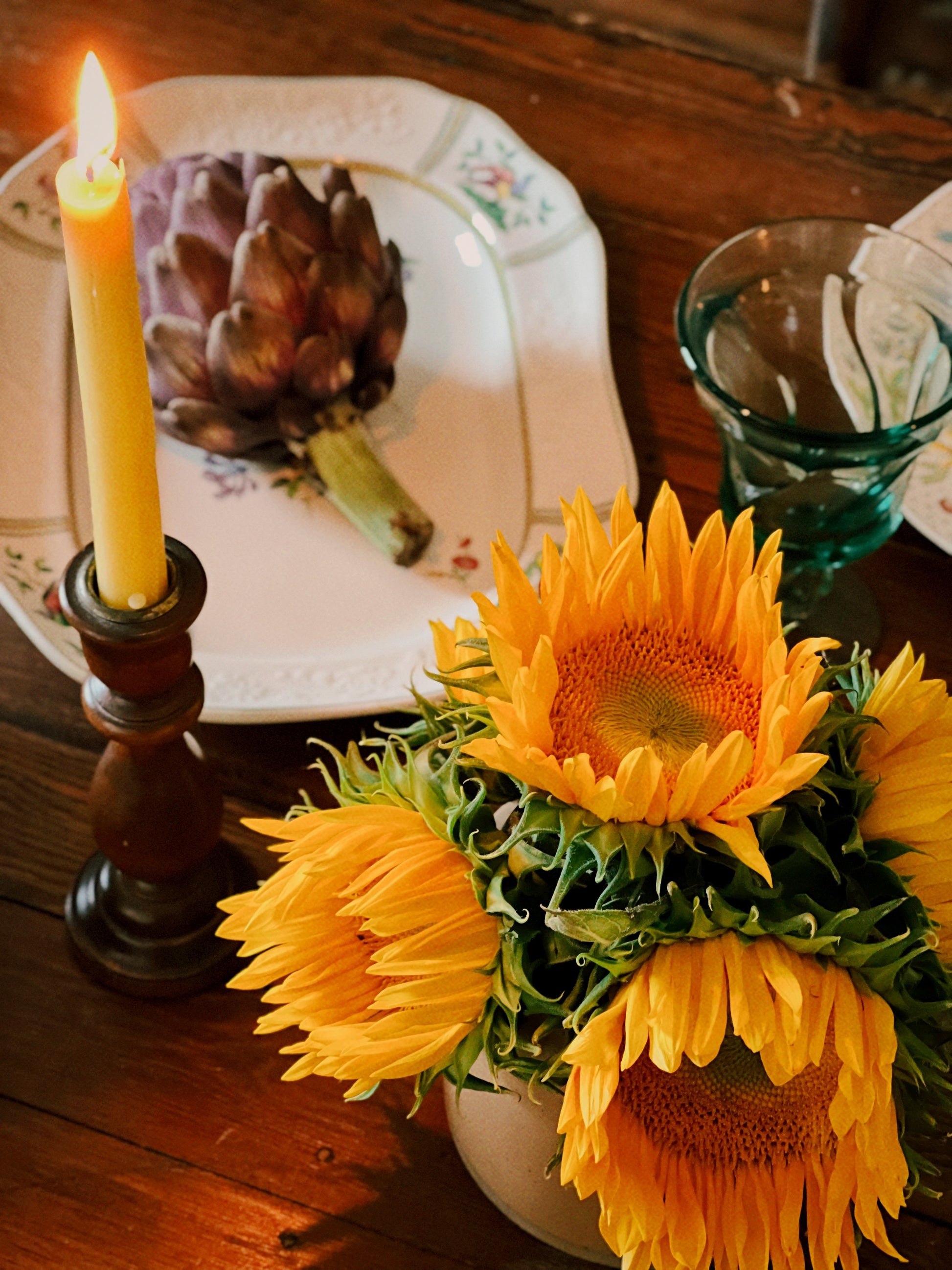 Copeland Spode June platter on a table with candlelight and sunflowers