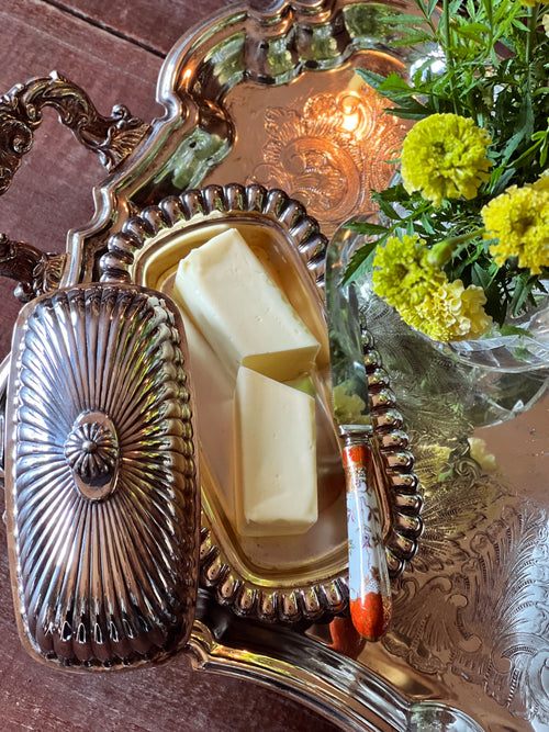 Vintage silver butter dish styled for brunch and entertaining