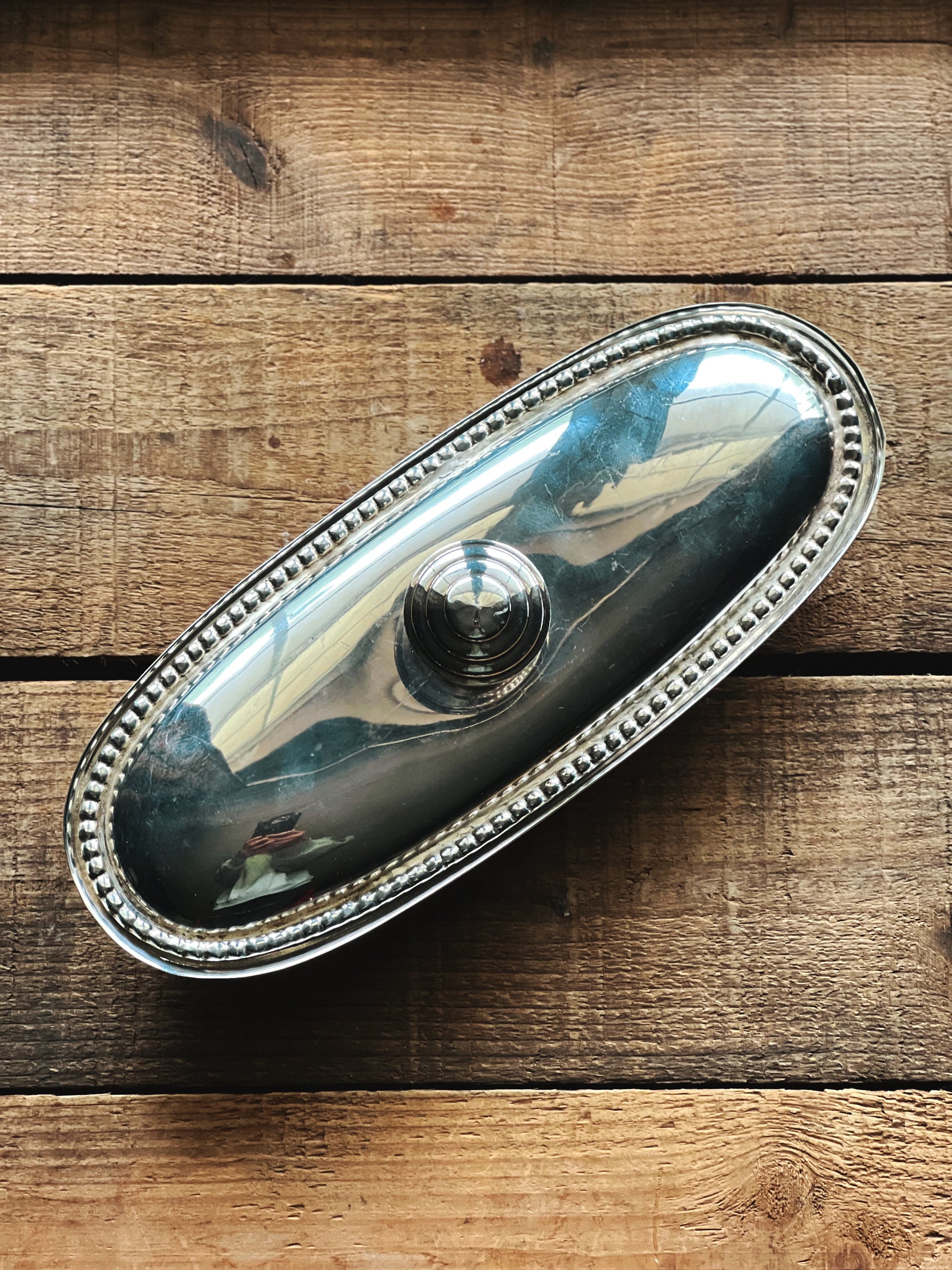 Elegant silverplate covered dish with classic beaded trim