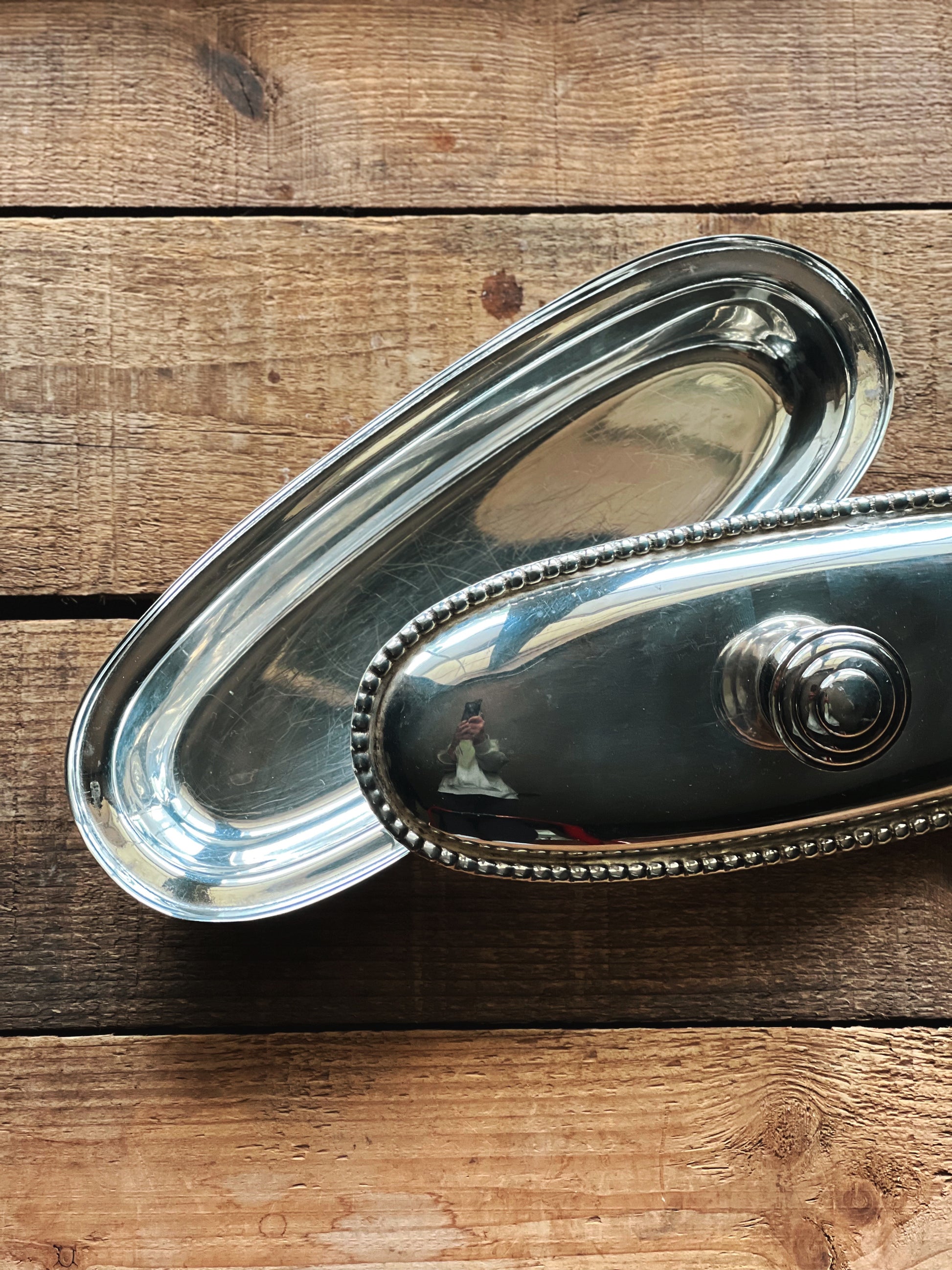 Vintage RR International silverplate dish with lid and oval silhouette