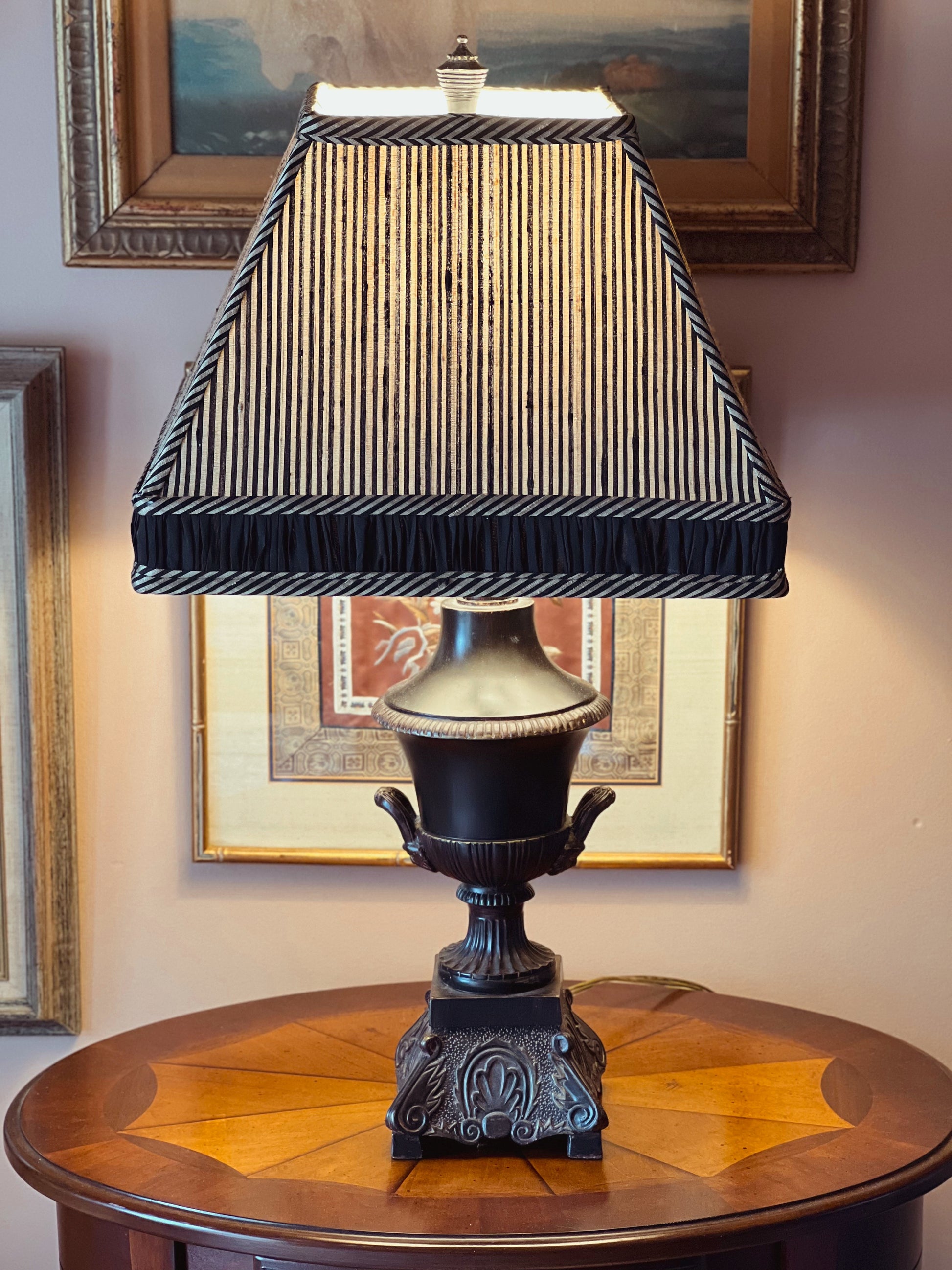 Vintage striped raw silk lampshade paired with black urn table lamp