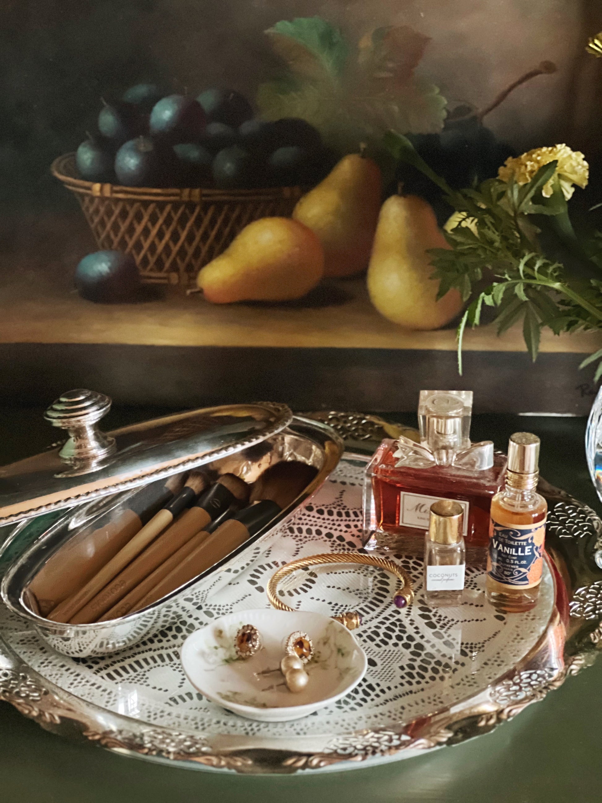 Silver tray filled with vanity essentials