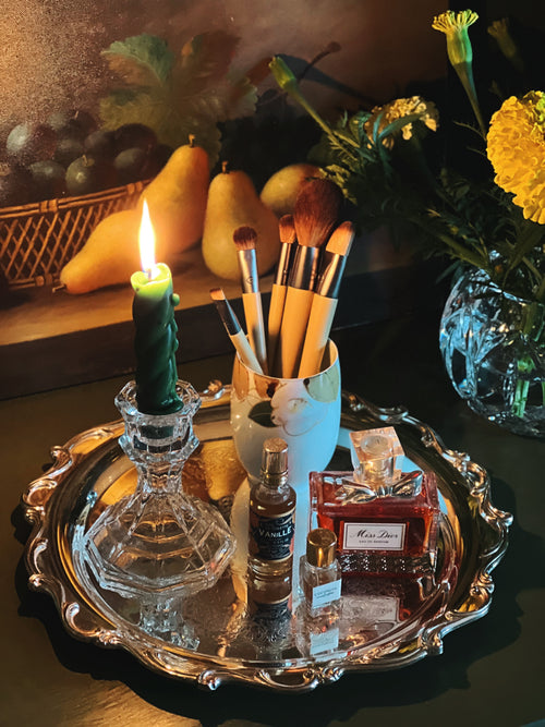 Romantic vintage silver vanity tray styled with candlelight