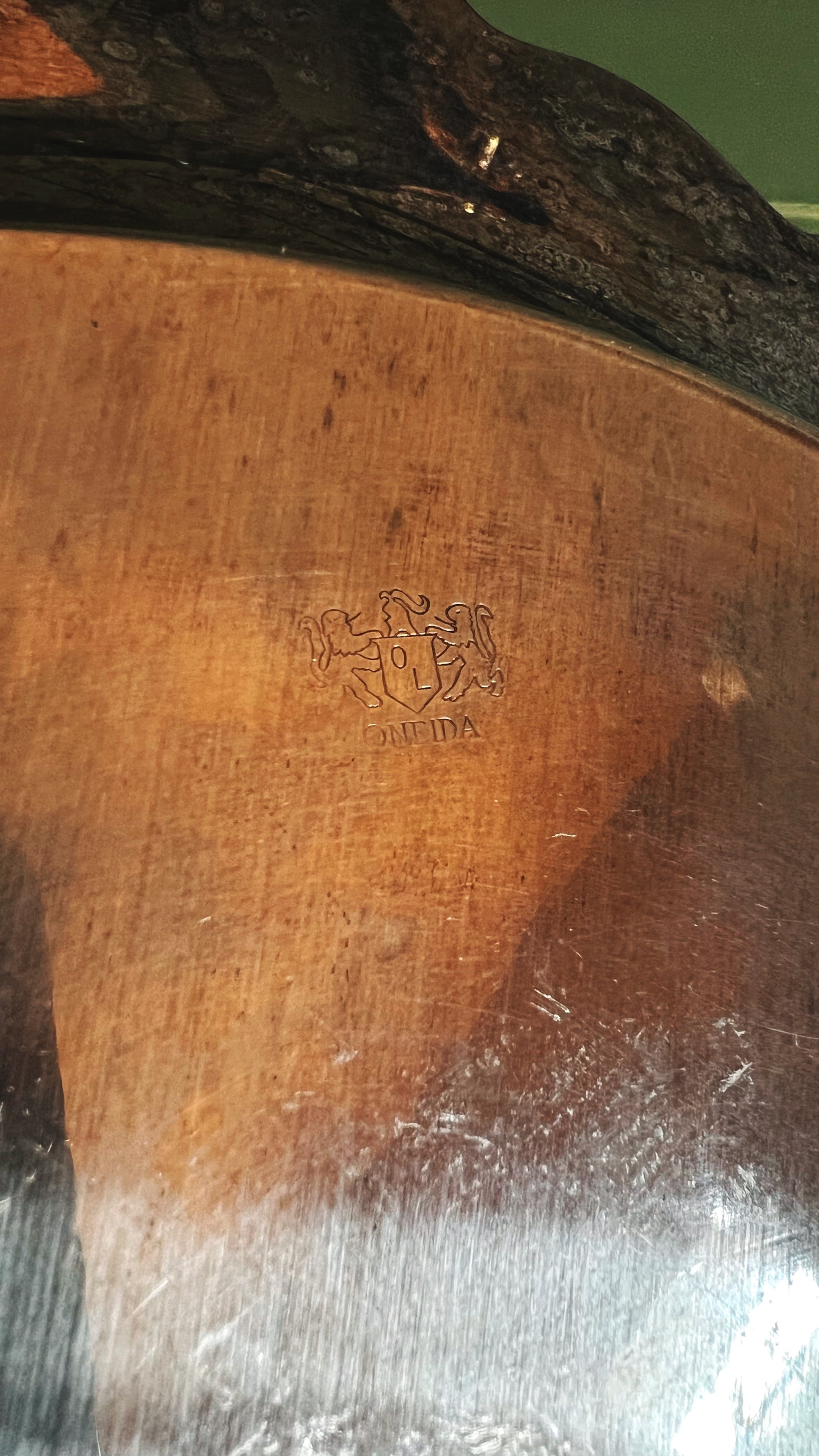 Oneida maker's mark on the underside of a silverplate tray