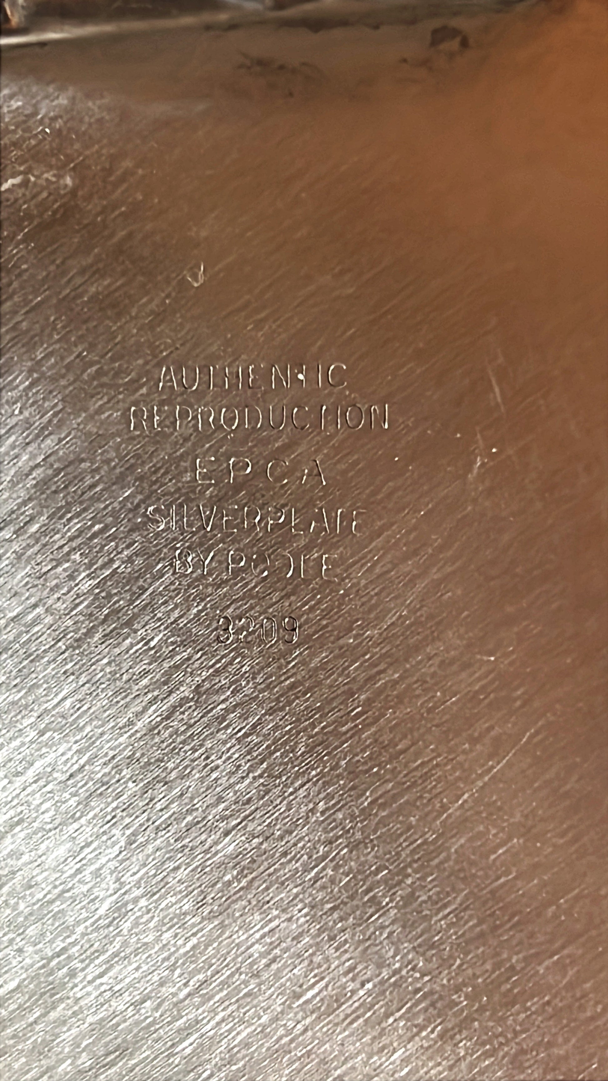 Poole silver maker's mark on the underside of a silver tray