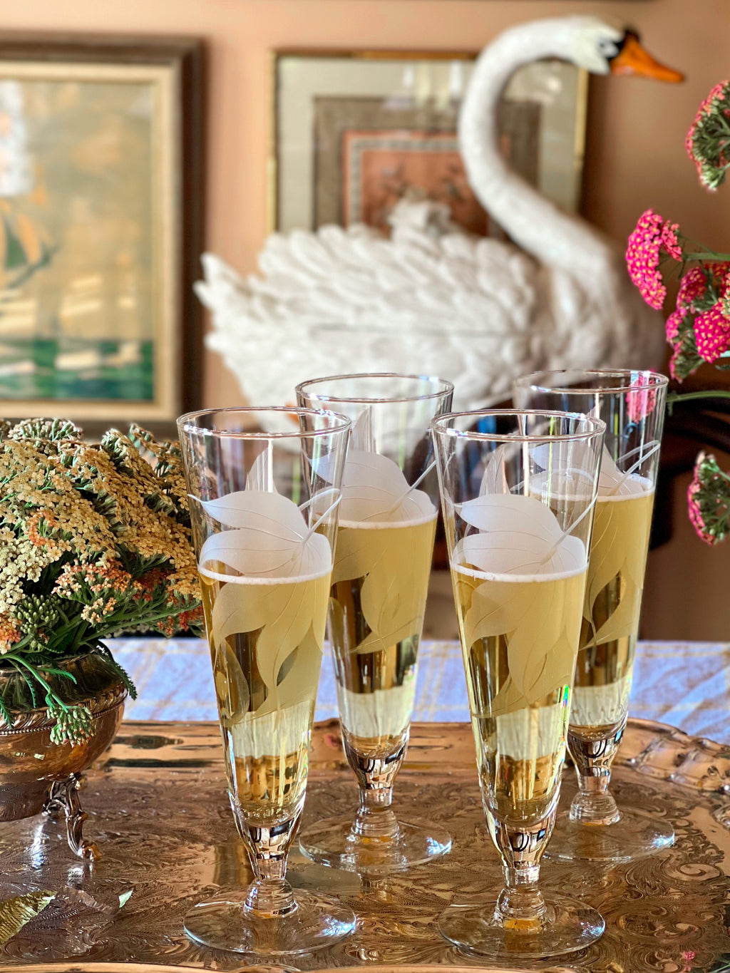 Grouping of vintage champagne flutes perfect for mimosas and celebrations.