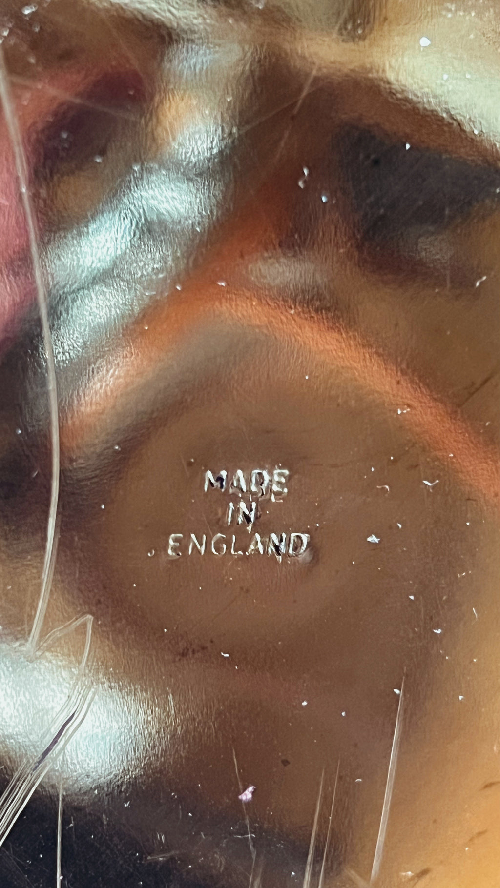 Maker’s mark on underside of vintage English cachepot.