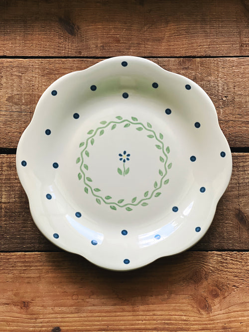 Set of four vintage Pfaltzgraff Cloverhill floral salad plates with scalloped edges and blue and green accents.