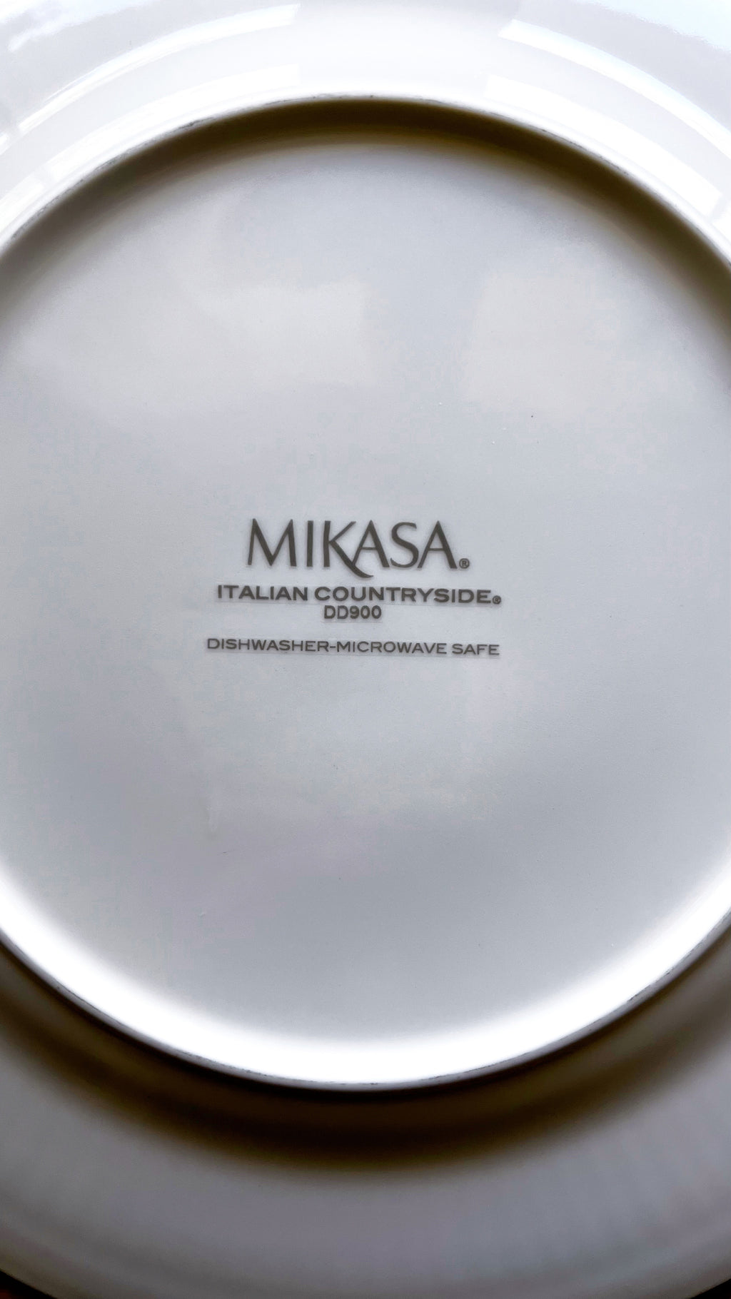 Mikasa dish with 'Italian Countryside' pattern on a white background