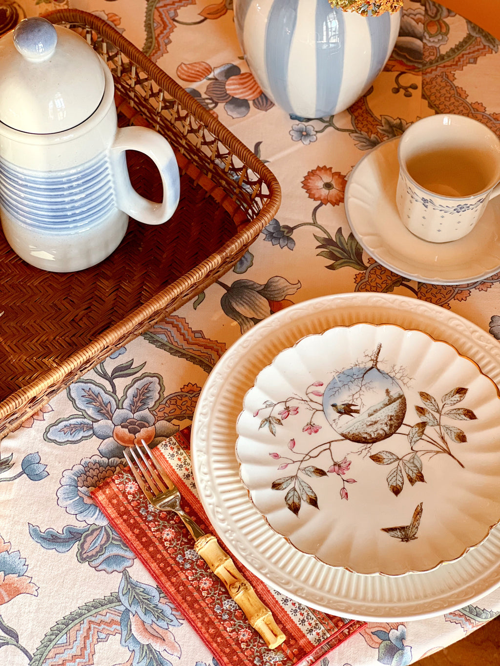 Mikasa Italian Countryside dinner plate with a decorative salad plate on a table set for breakfast