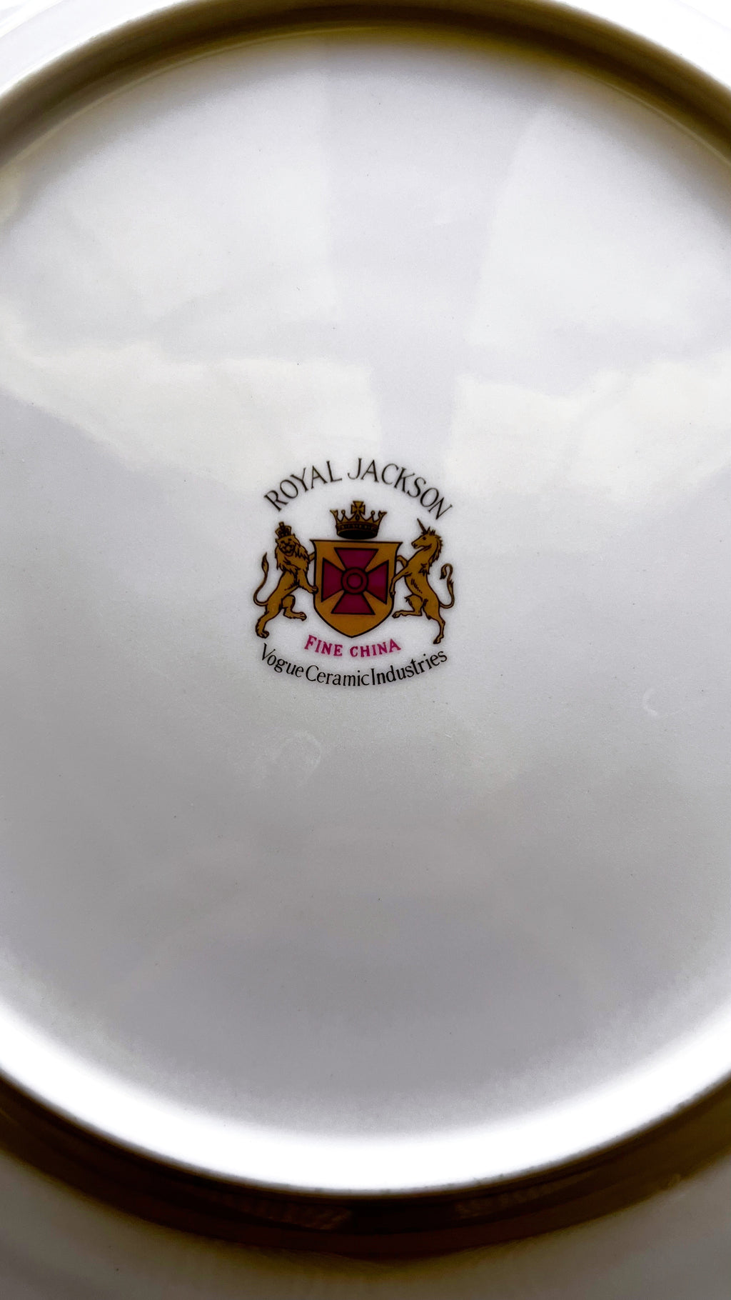 Close-up of a Royal Jackson ceramic product with logo on a white background