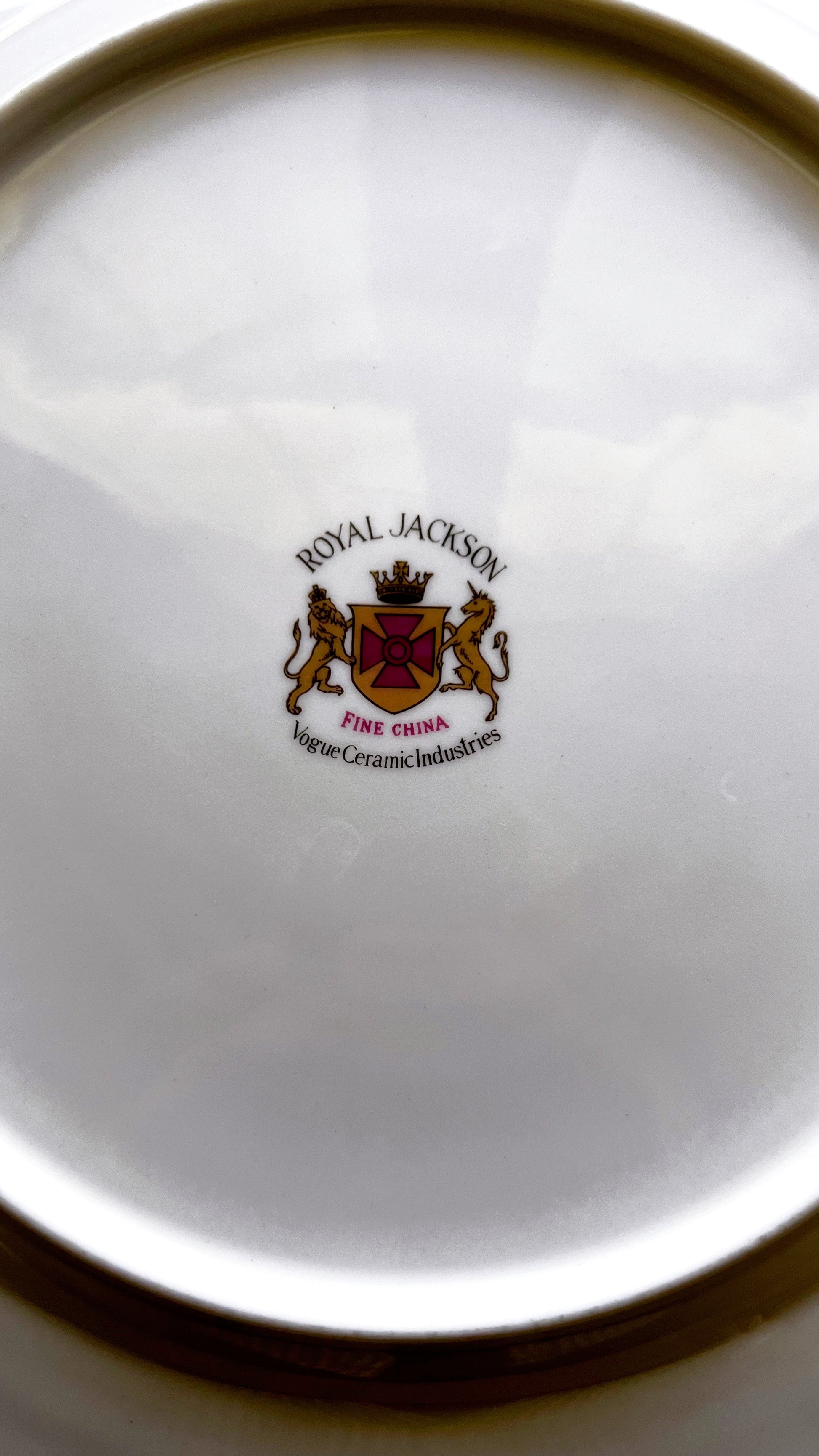 Close-up of a Royal Jackson ceramic product with logo on a white background