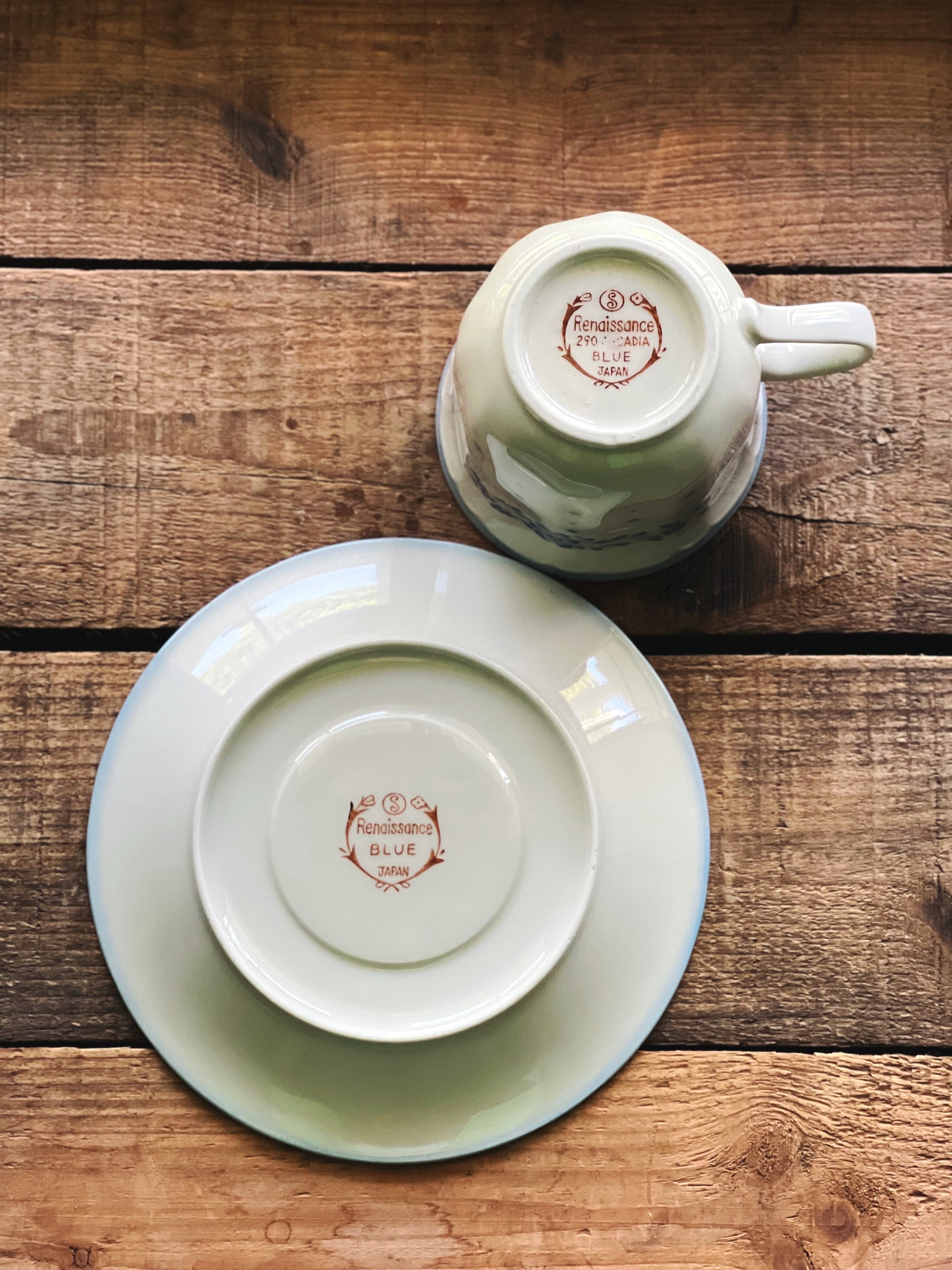 underside of a Sango Arcadia Blue teacup and saucer set