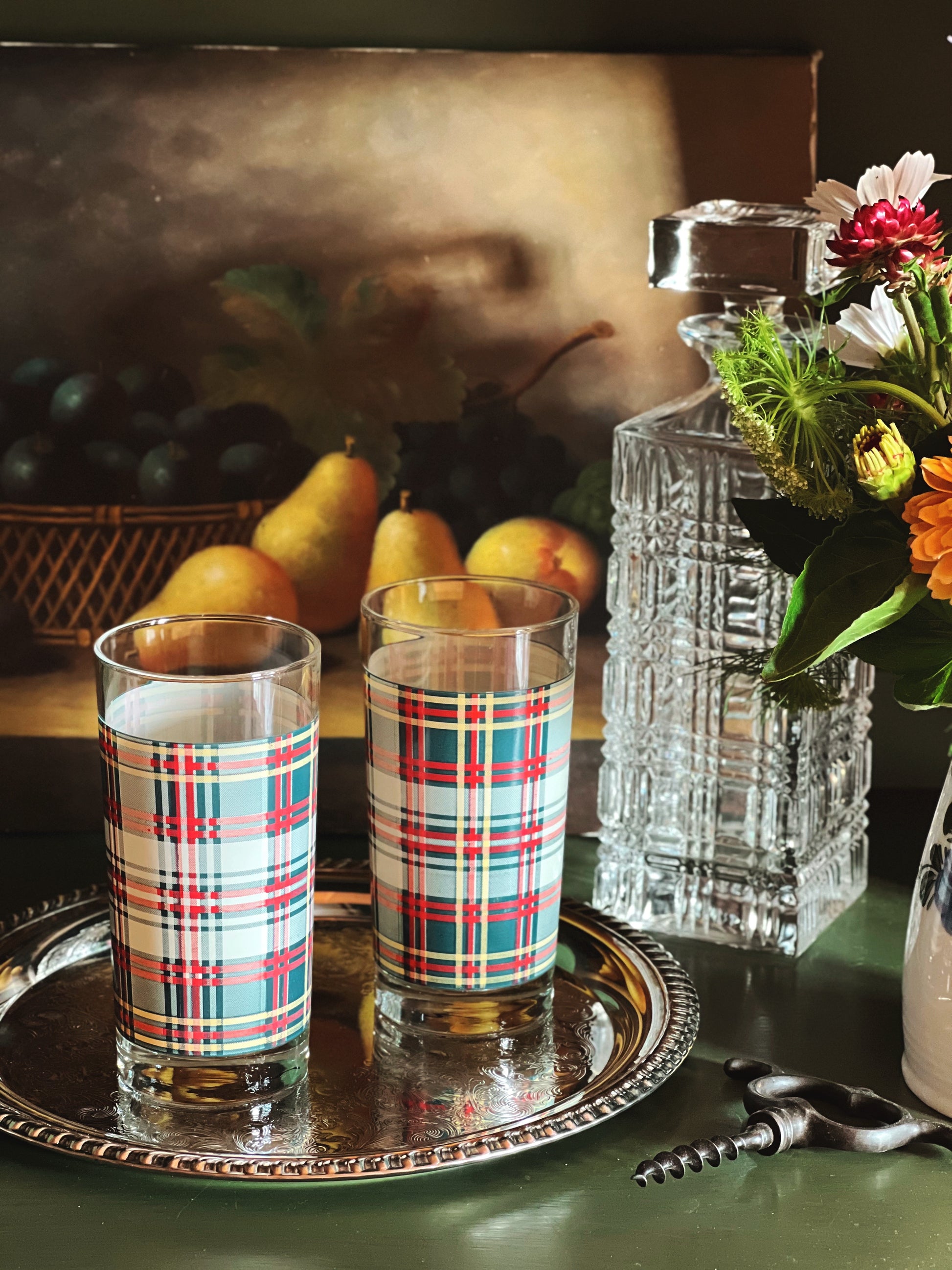 Pair of Ralph Lauren heritage plaid highball glasses on a silver tray