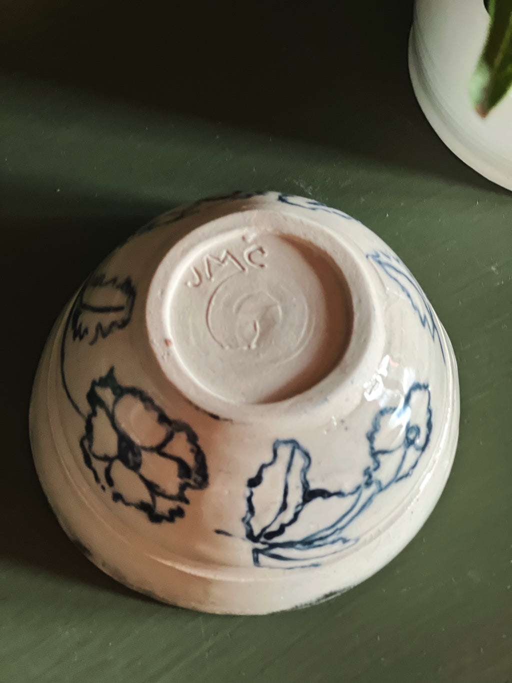 potter's mark on a Handmade Blue Floral Pottery Bowl