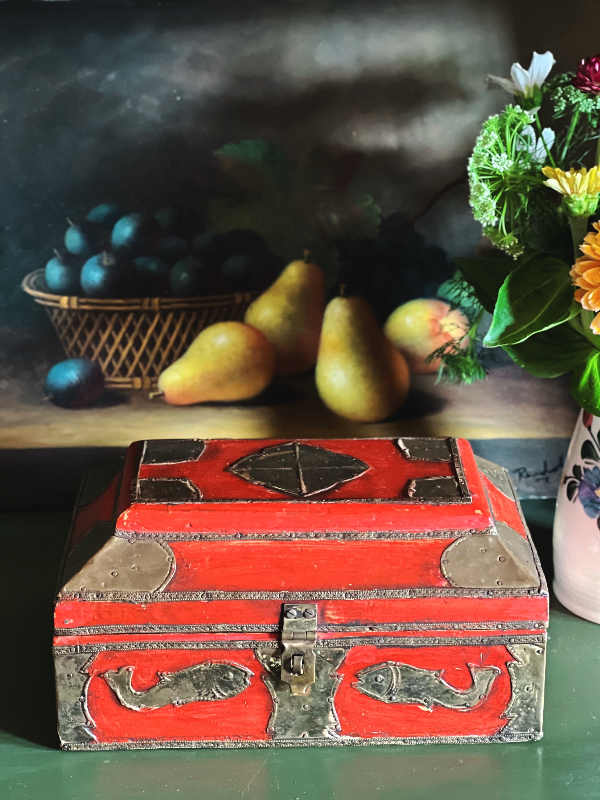 Decorative vintage treasure box styled with collected home décor
