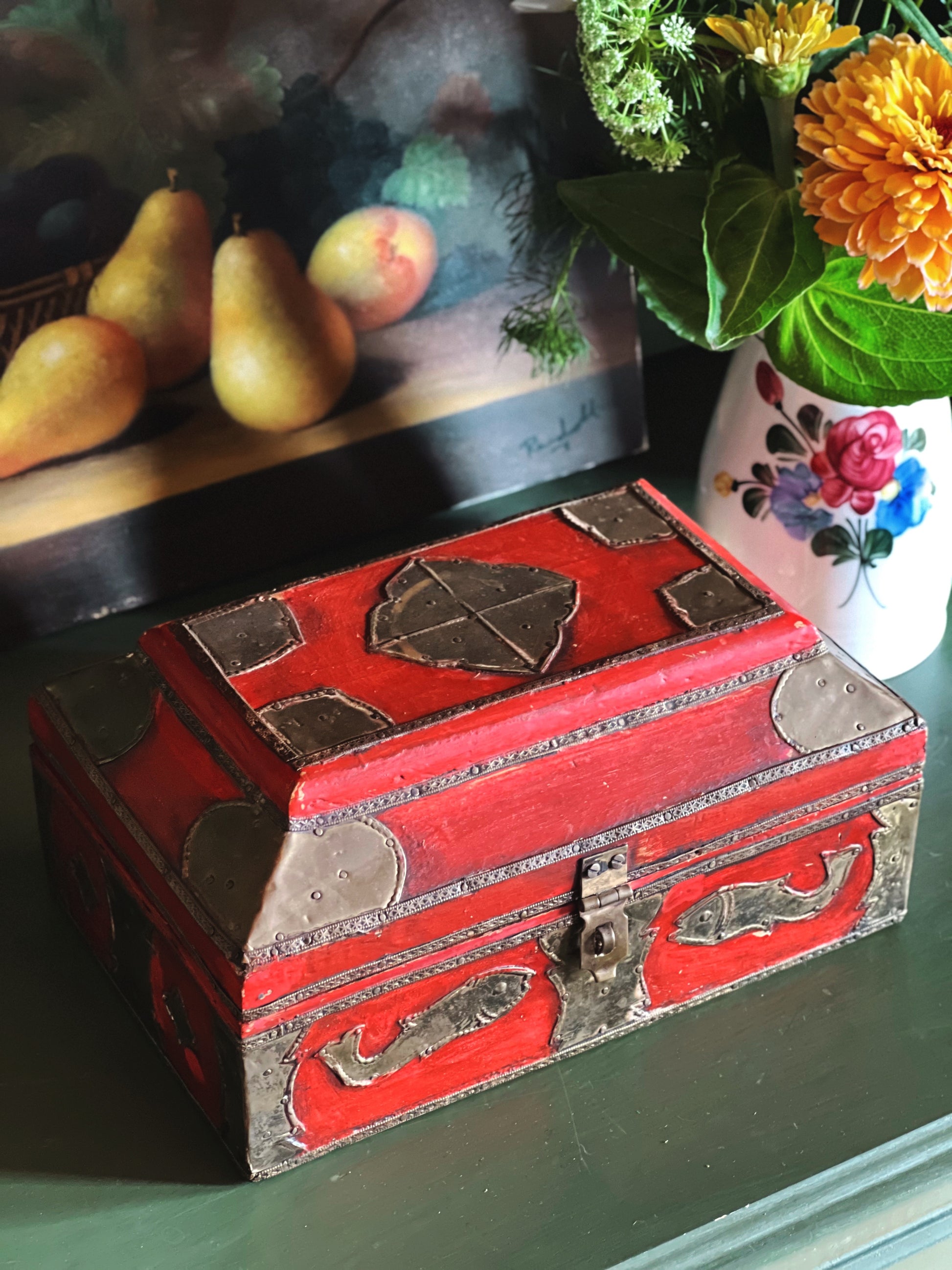 Decorative vintage treasure box styled with collected home décor