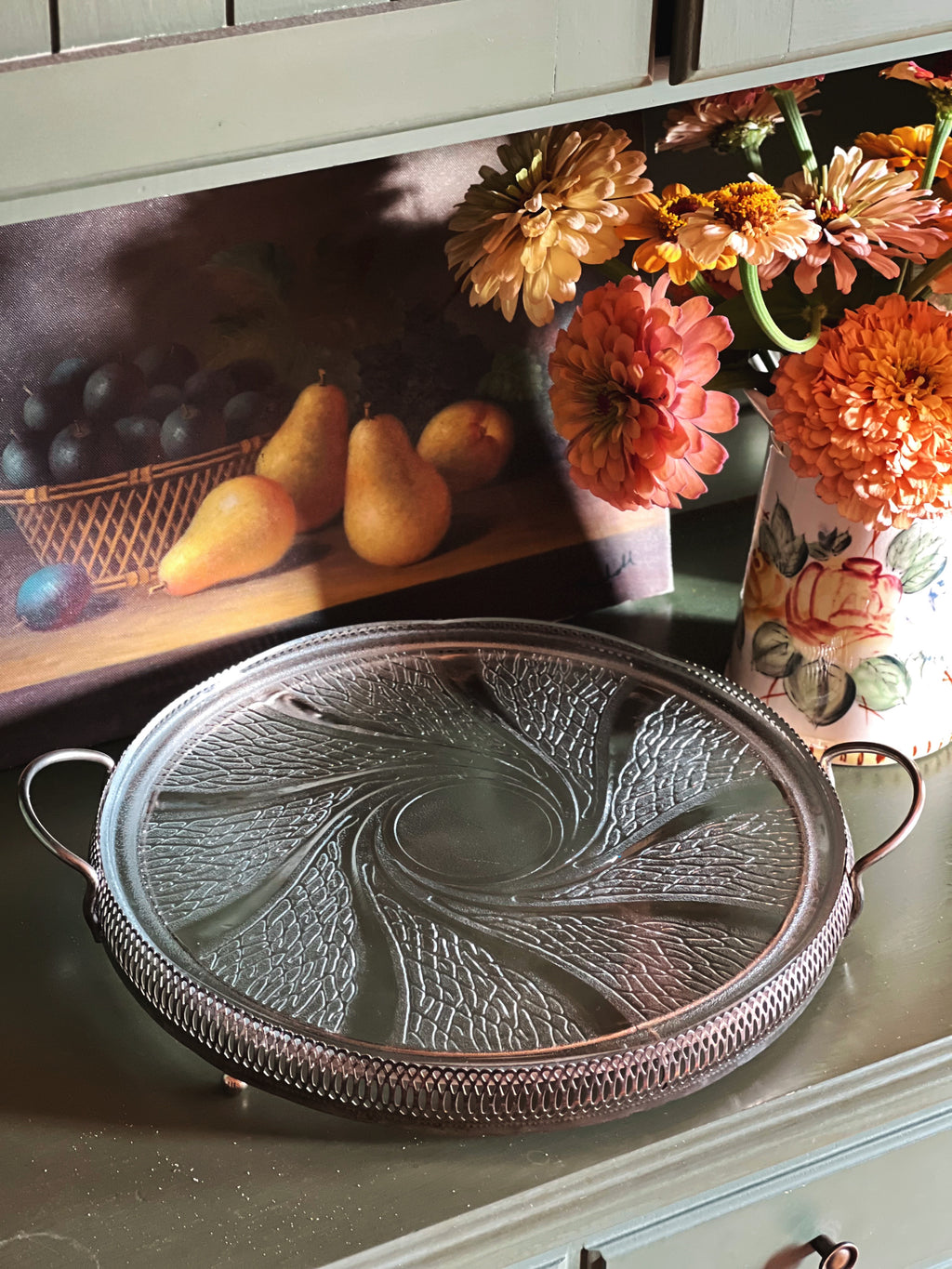 Vintage frosted swirl glass serving platter in a silver footed stand 