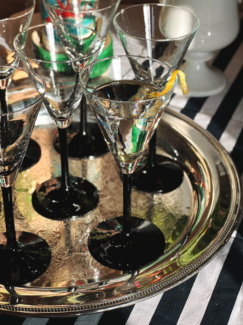 Vintage Crystal Martini Glass with Black Stem styled on a silver tray 