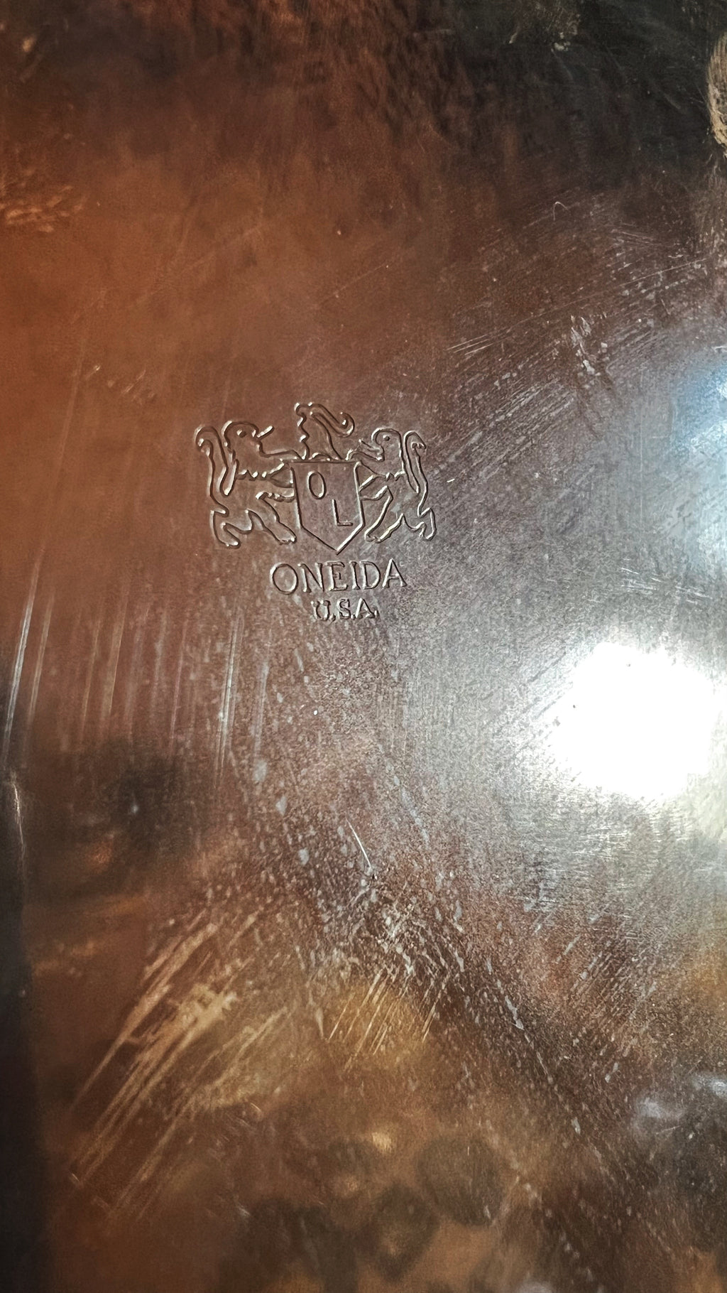 Oneida brand marking on a vintage silver tray