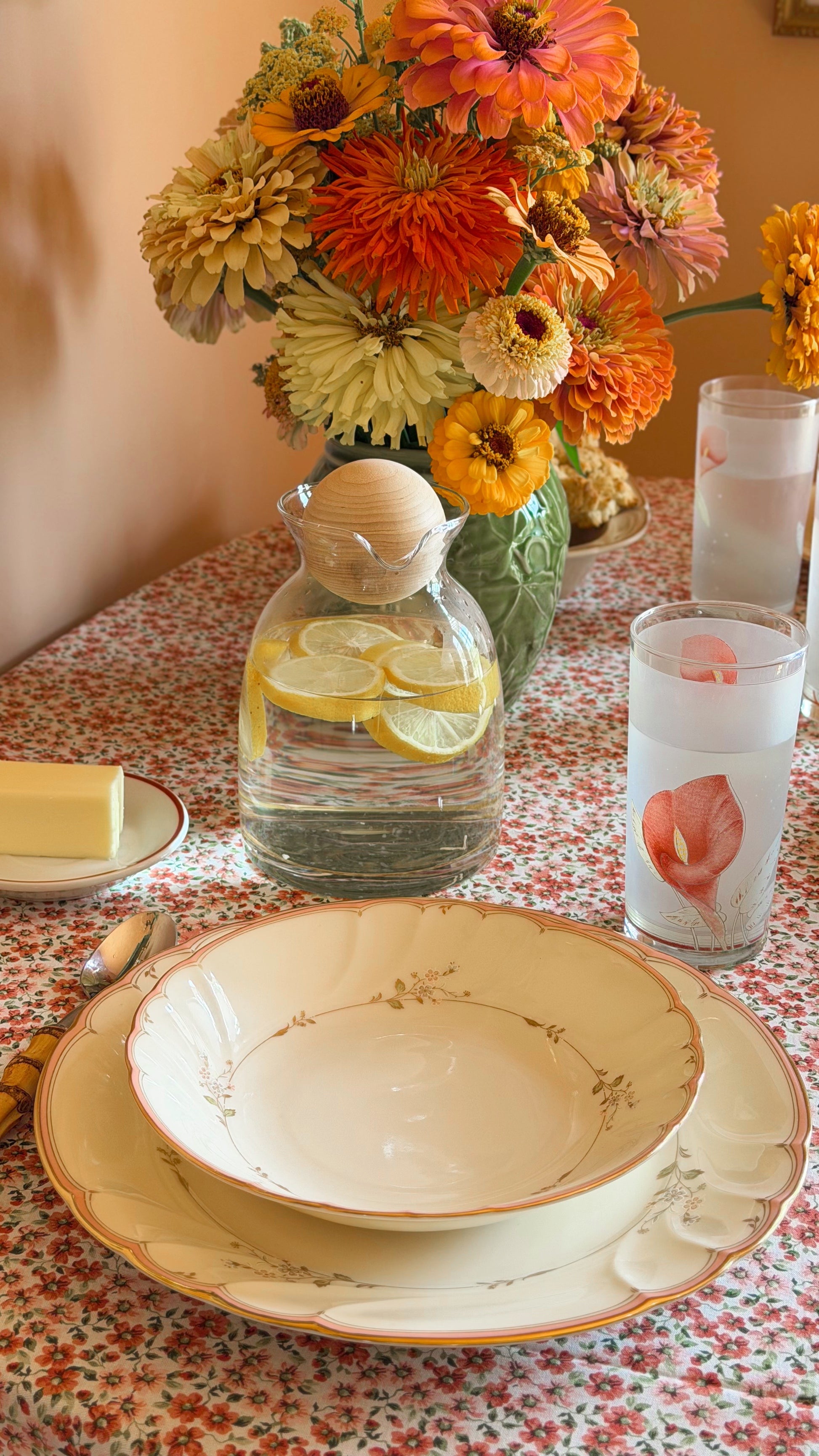 Vintage Clear Glass Double Spout Decanter with Ball Stopper on a cozy cottage table 