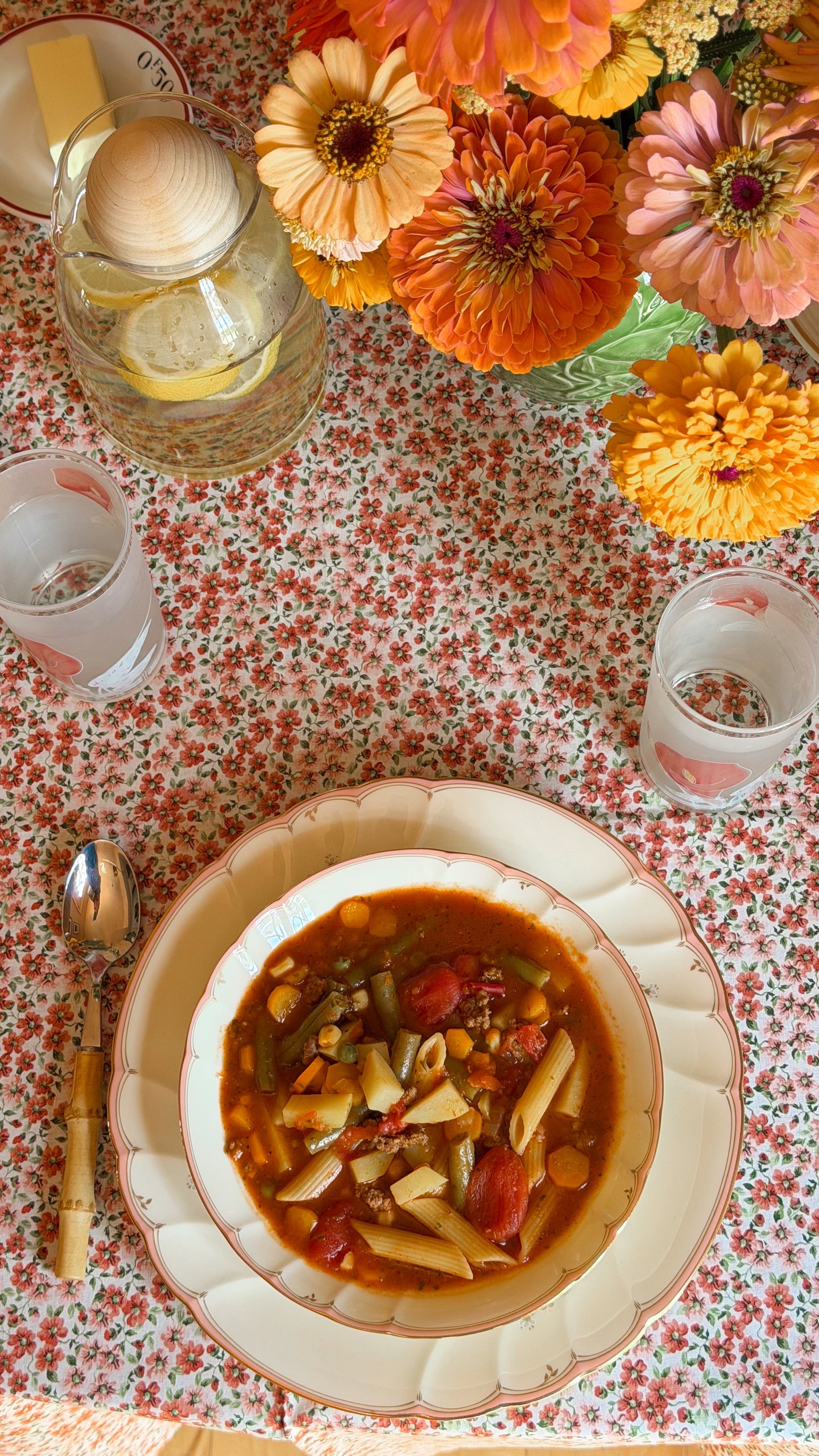 Cozy cottage table set with a Vintage Mikasa Monticello coupe soup bowl filled with vegetable soup