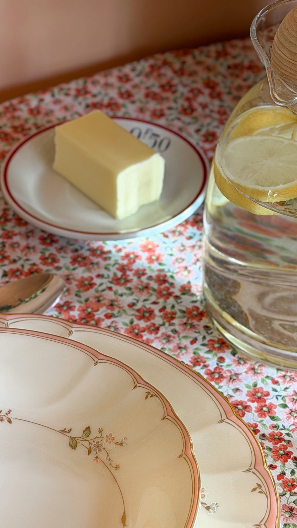 Pillivuyt France white porcelain saucer with butter on a cozy cottage table