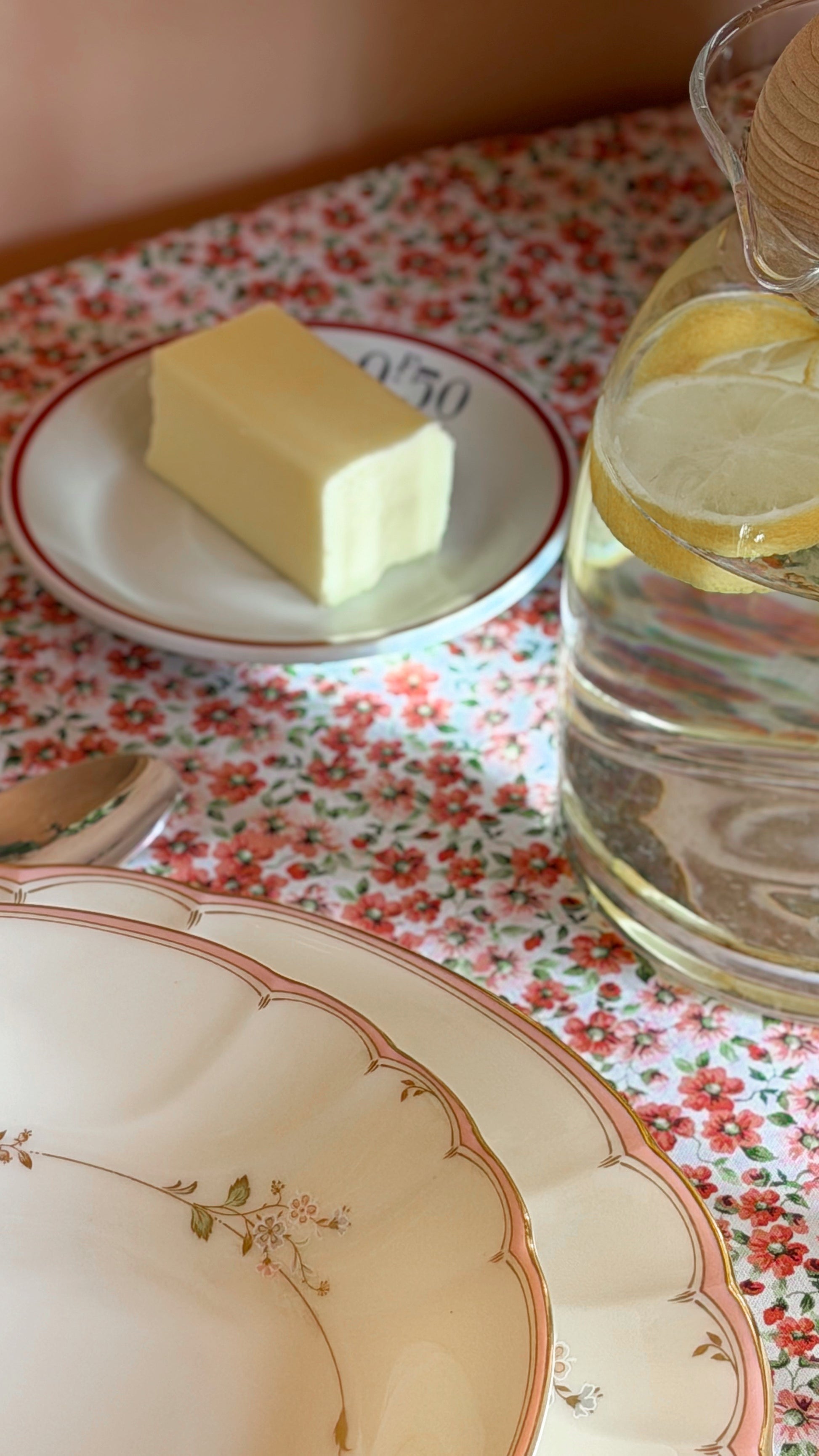 Pillivuyt France white porcelain saucer with butter on a cozy cottage table